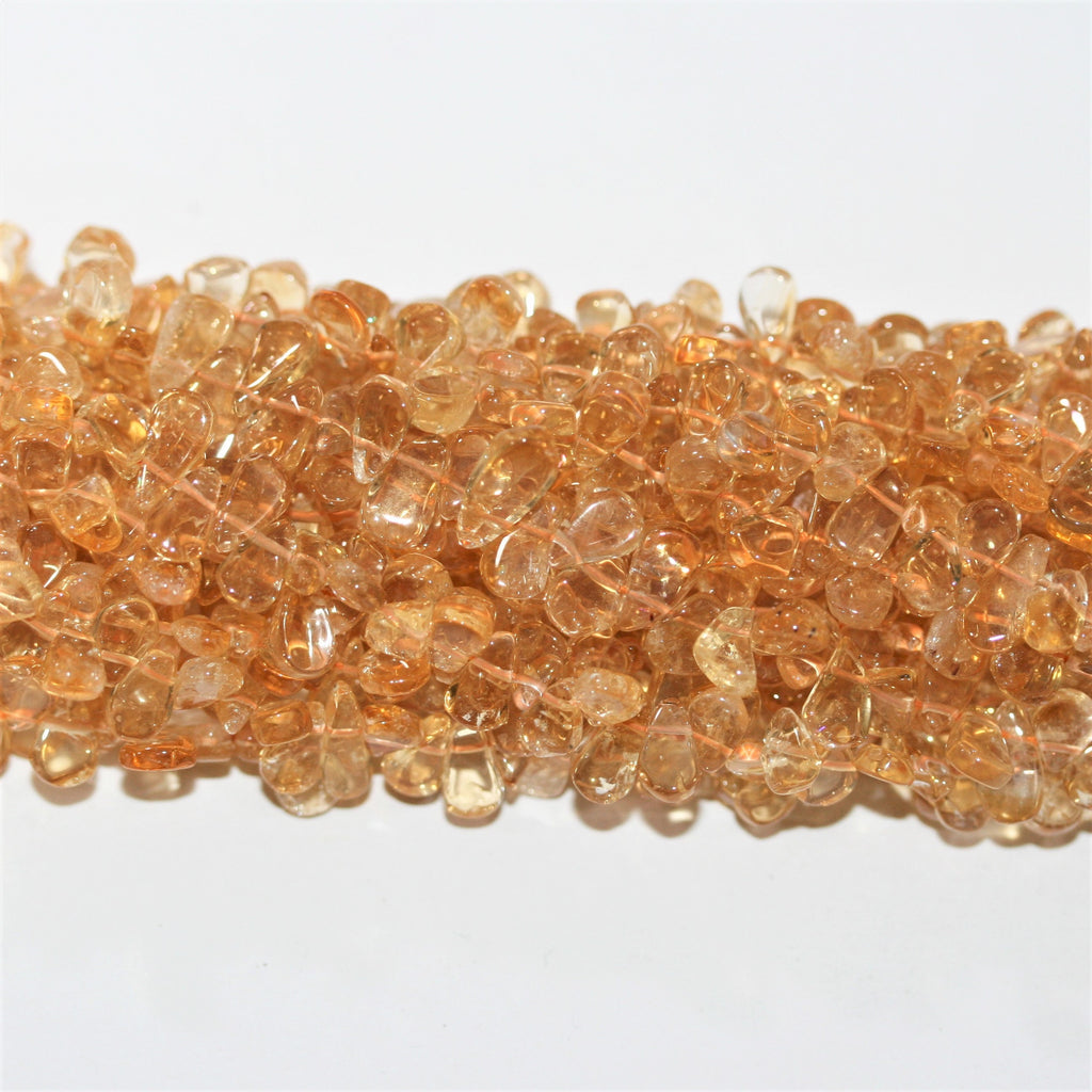 Perles plates lisses en citrine St de 15 pouces (8 x 5 mm). Longueur approximative du brin : 38 cm.