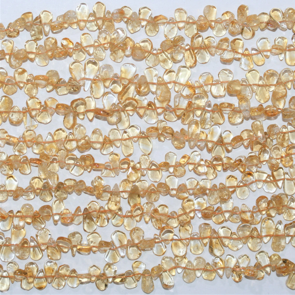 Perles plates lisses en citrine St de 15 pouces (8 x 5 mm). Longueur approximative du brin : 38 cm.
