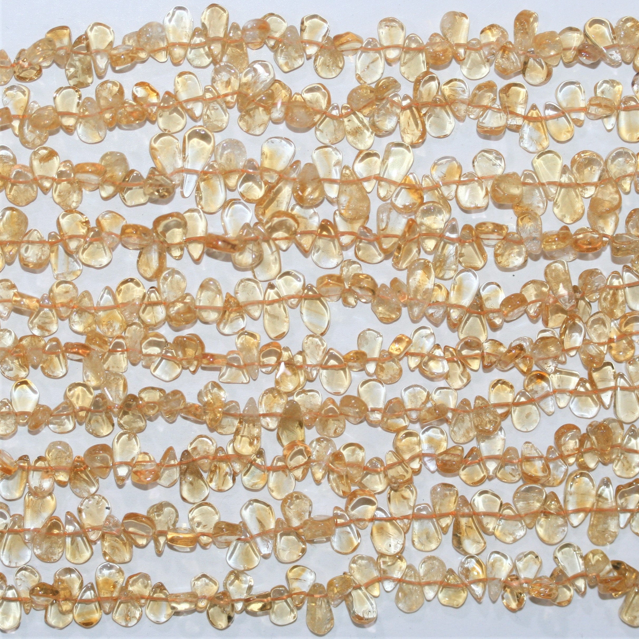 Perles plates lisses en citrine St de 15 pouces (8 x 5 mm). Longueur approximative du brin : 38 cm.