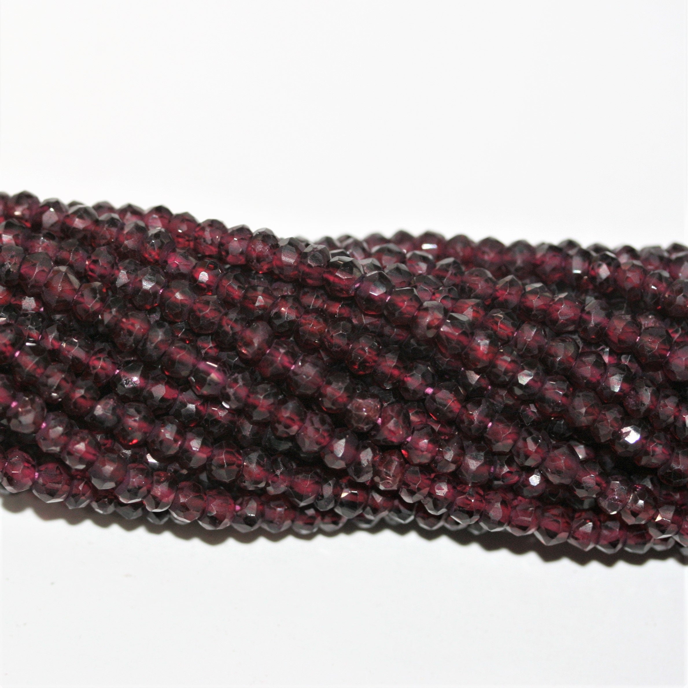 13" St Garnet Faceted Rondelle Beads 4x3mm.- Strand 33cm.