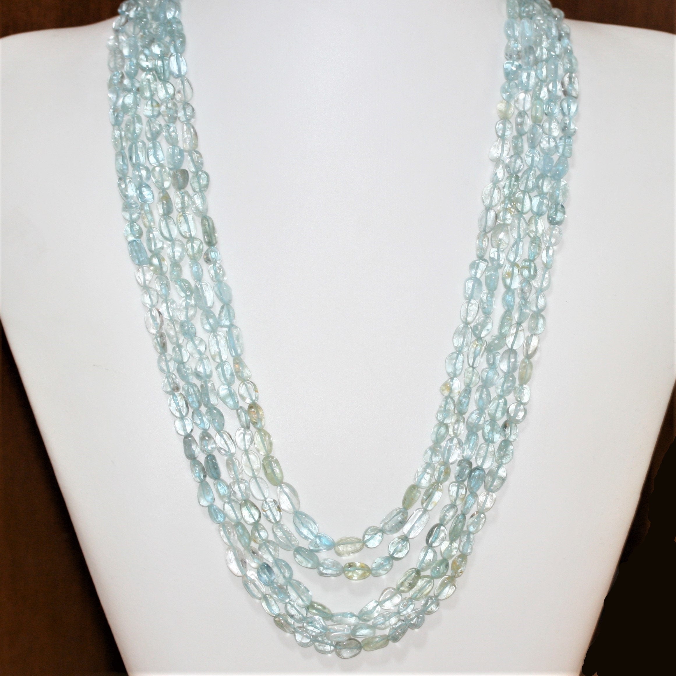 Collier ovale lisse en aigue-marine, environ 9 x 6 mm (5 rangs)