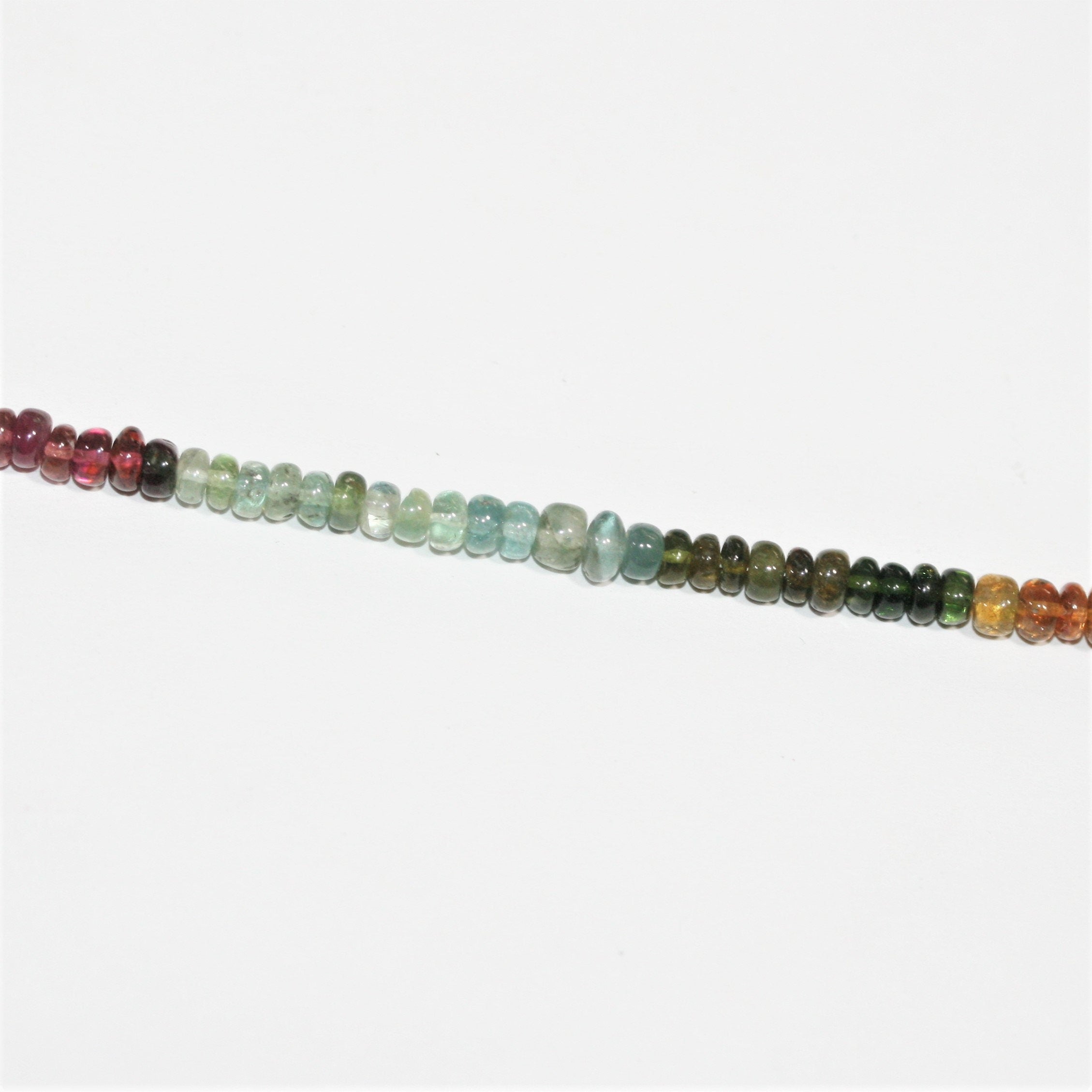 Cuentas redondas lisas de turmalina St. de 16", 4 x 2 mm. Aprox. - Hilo de 40 cm.