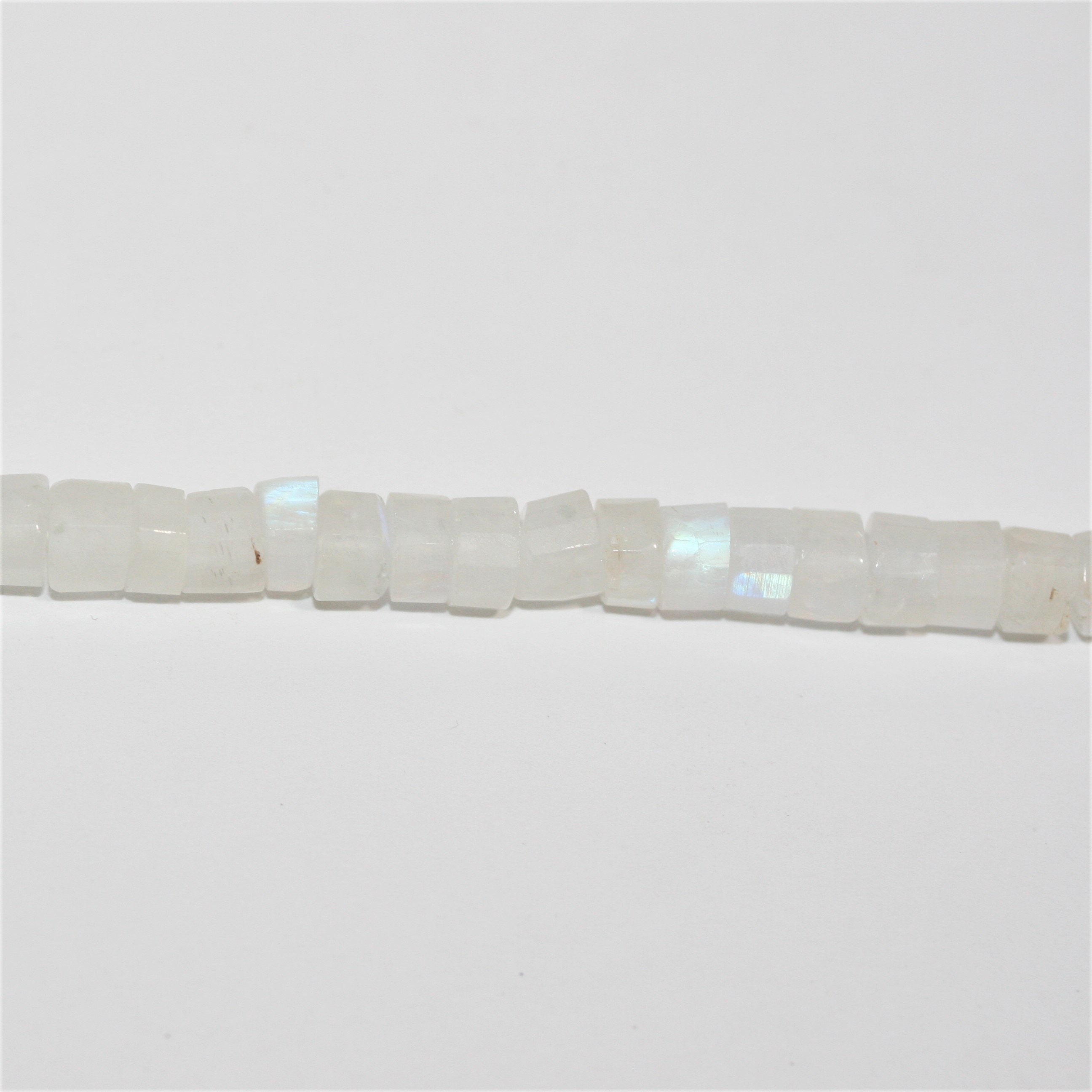 14" St Moonstone Faceted Disc Beads 6x4mm.- Strand 36cm.