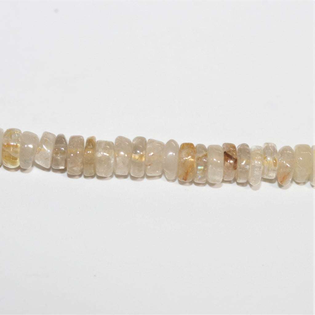 Perles de quartz rutile lisses en forme de disque de 14 pouces (6 x 3 mm). Longueur approximative du brin : 35 cm.