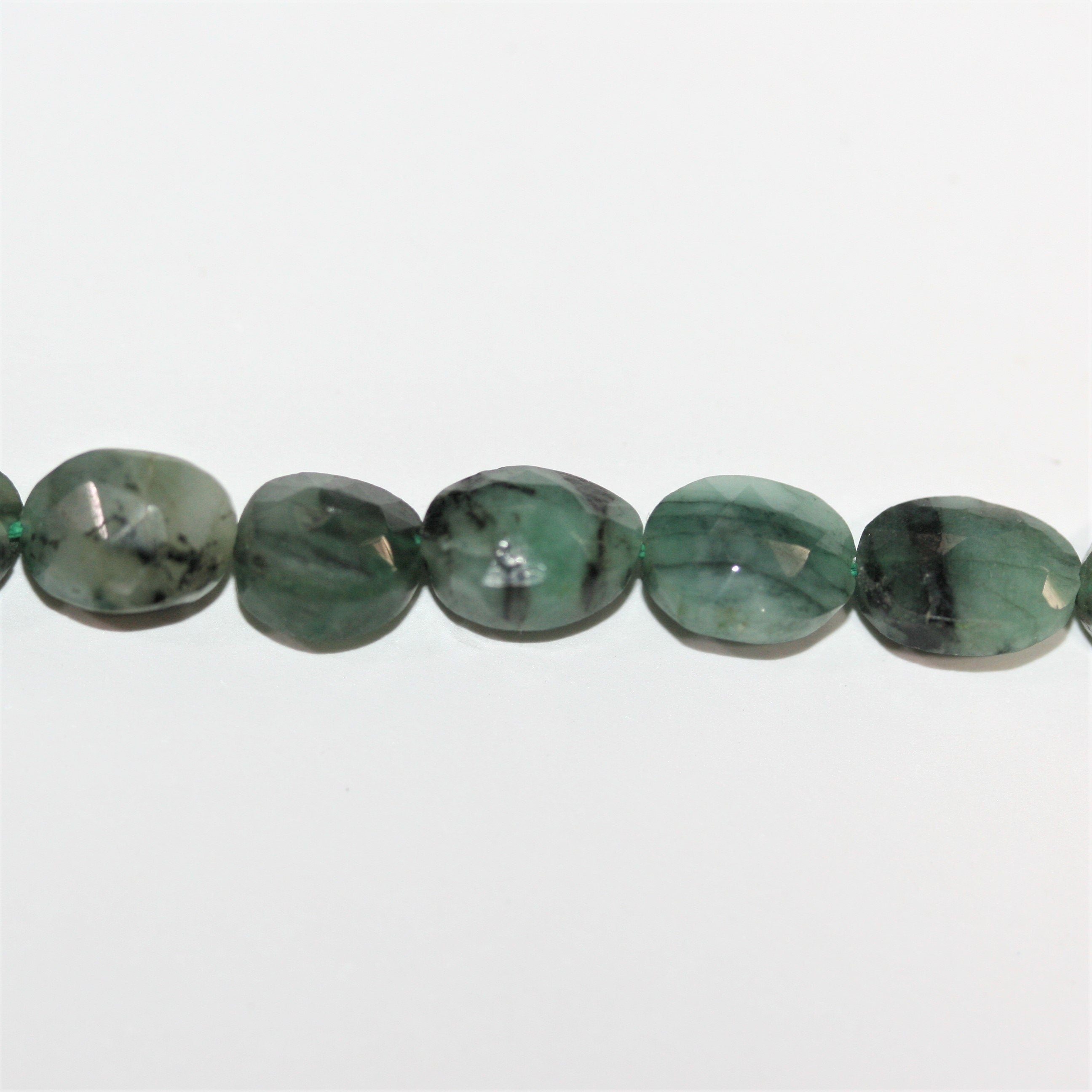 12" St Faceted Oval Emerald Beads 8x6mm.- Strand 30cm.