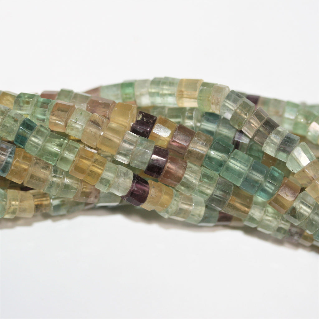 13" St Fluorite Faceted Disc Beads 6x3mm.- Strand 33cm.