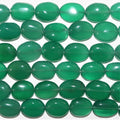 Cuentas ovaladas lisas graduadas de ónix verde St. de 17", 12 x 9-18 x 13 mm. Aprox. - Hilo de 44 cm.