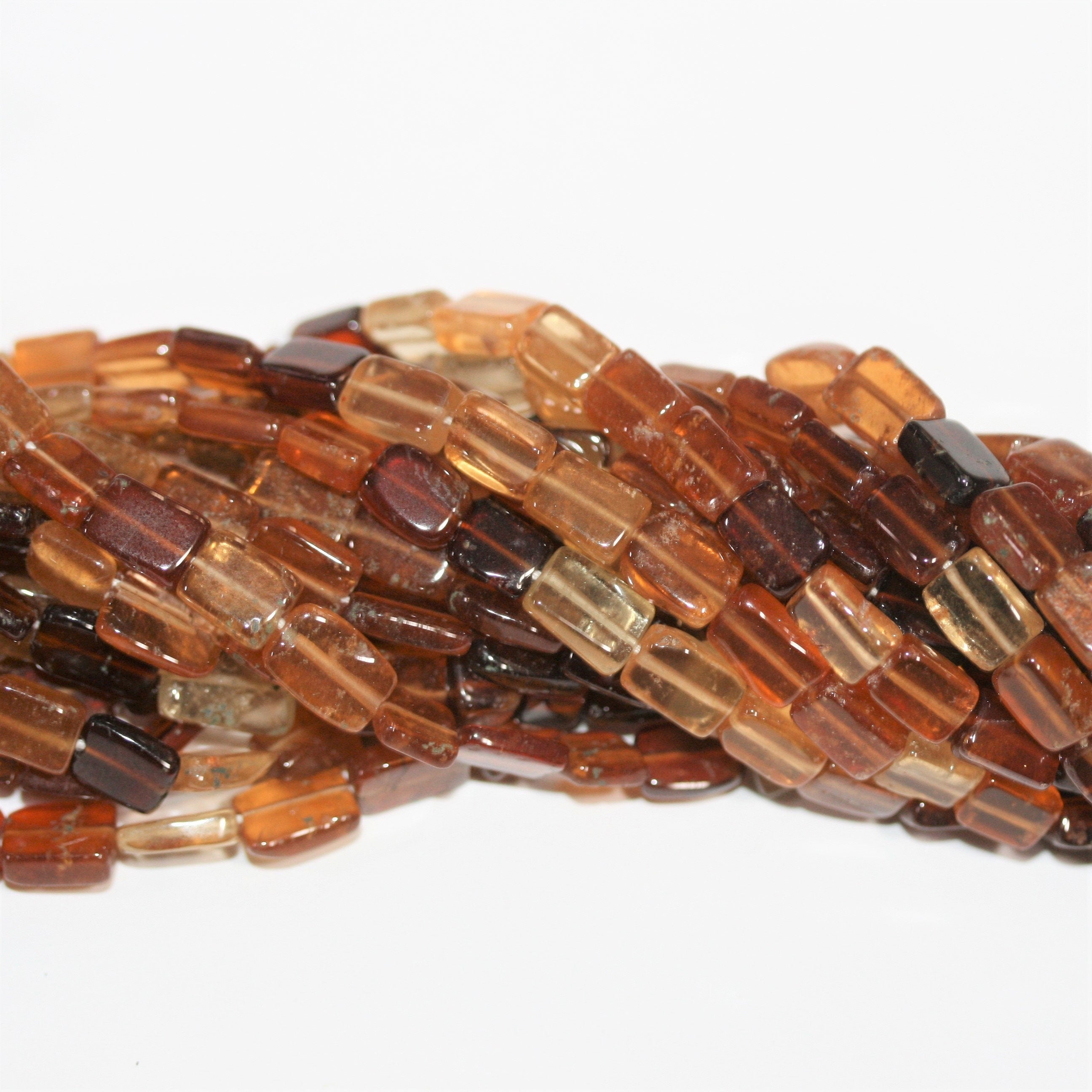 13" St Hesonite Garnet Smooth Prism Beads 8x5mm. Approx.- Strand 34cm.