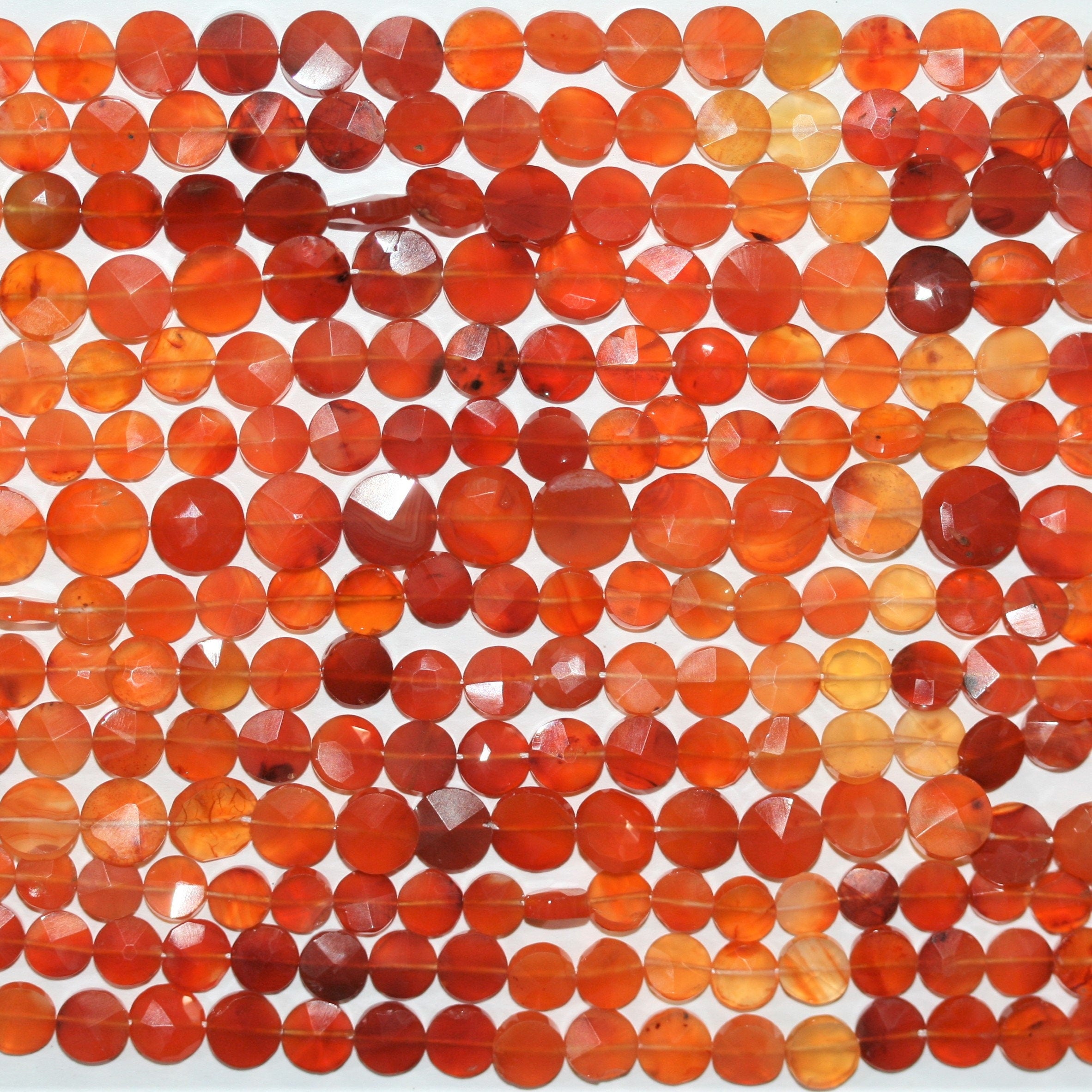 13" St Carnelian Faceted Coin Beads 7mm. Approx.- Strand 33cm.