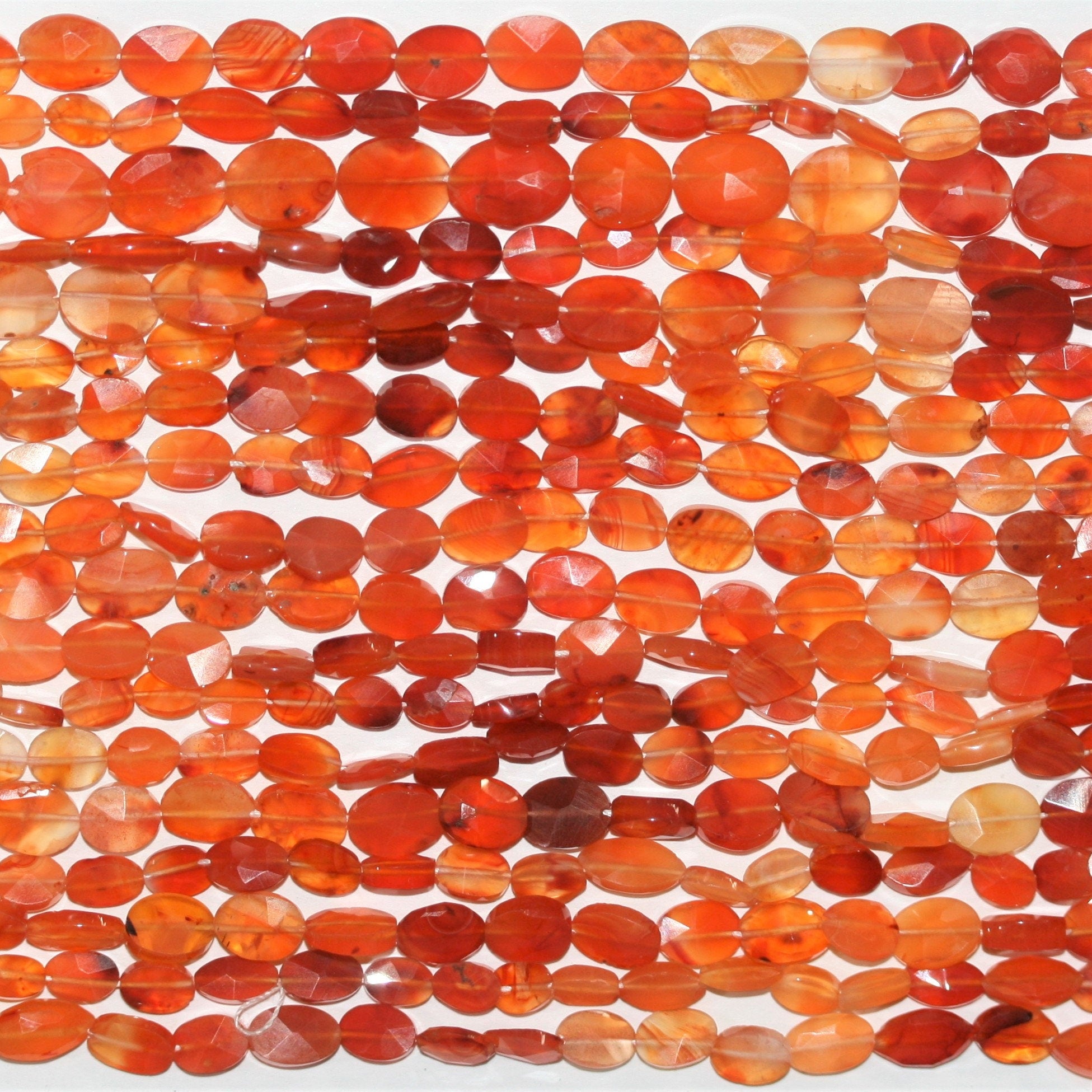 13" St Carnelian Faceted Oval Beads 9x6mm. Approx.- Strand 33cm.