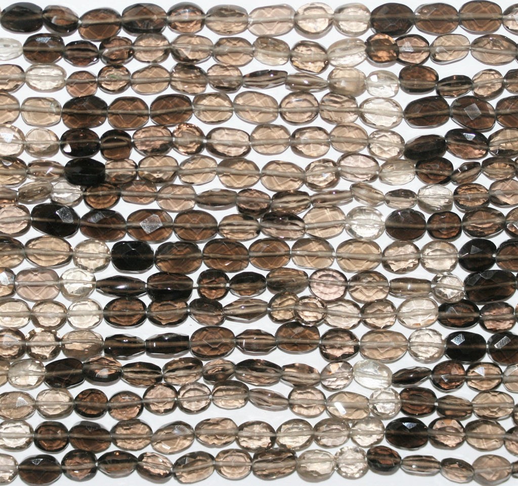 Perles ovales à facettes en quartz fumé St de 14 pouces (8 x 5 mm). Longueur approximative du brin : 36 cm.