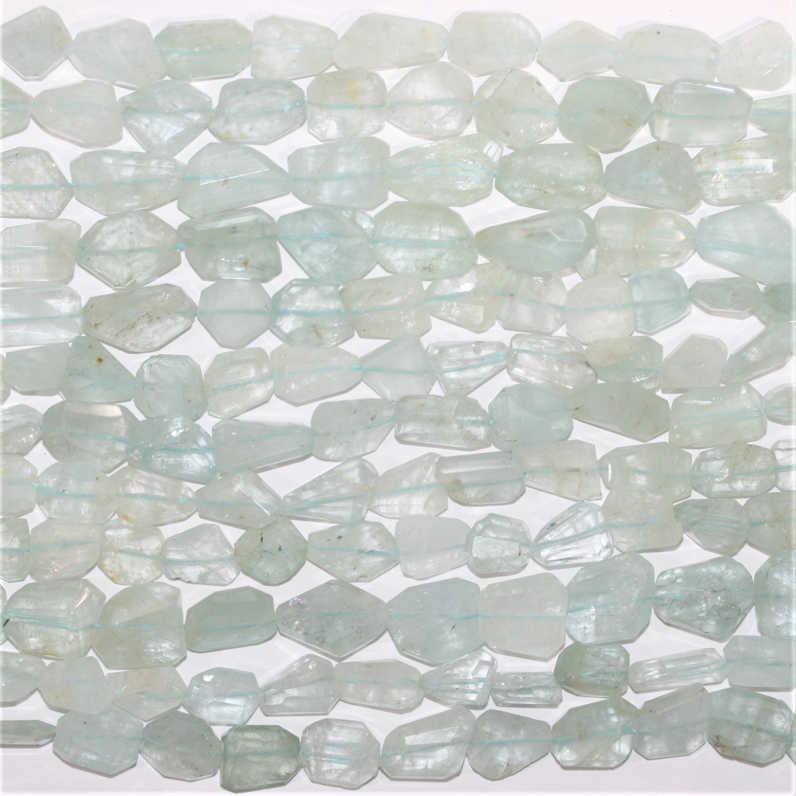 13" St Aquamarine Faceted Nugget Beads 10x8-20x12mm. Approx.- Strand 33cm.