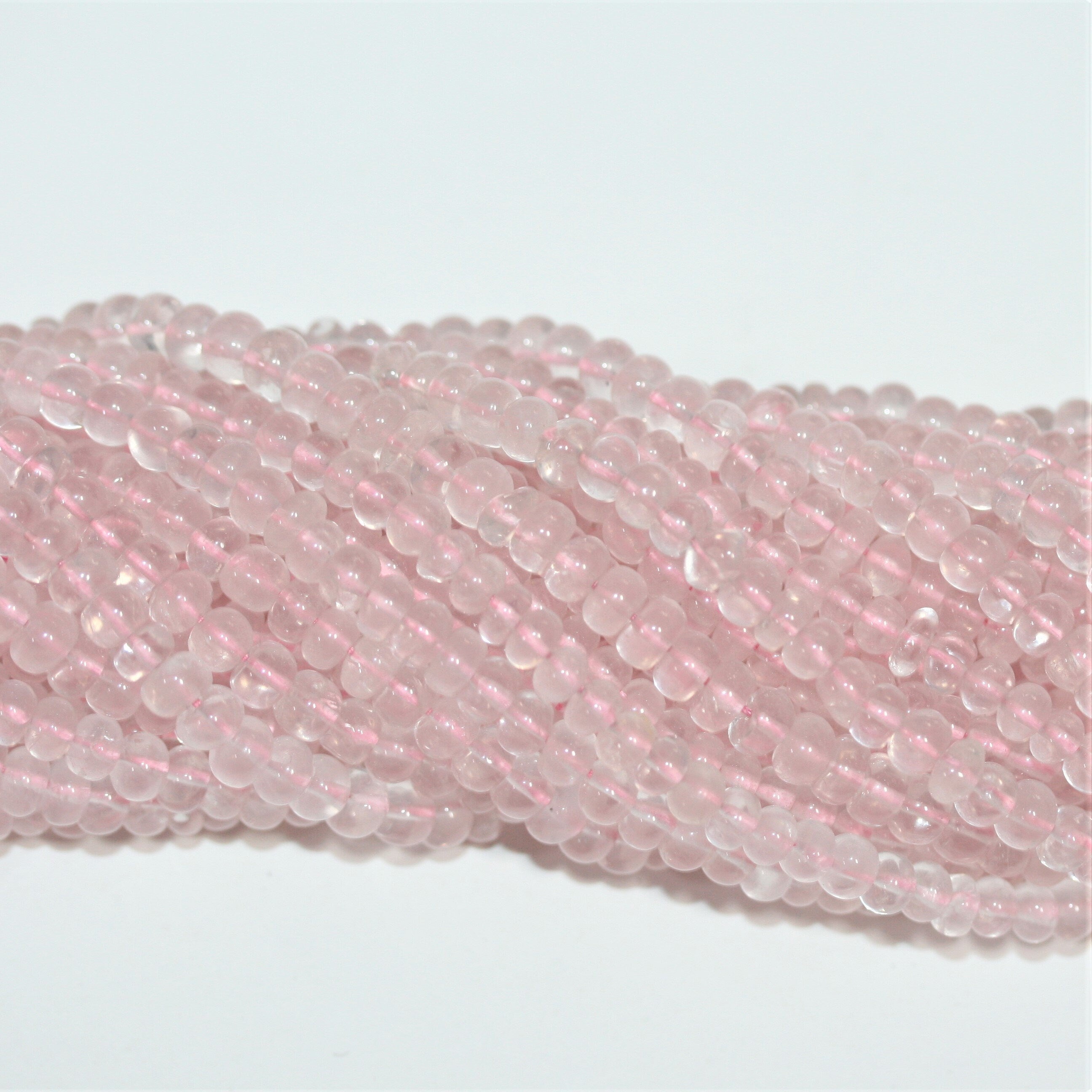 13" St Rose Quartz Smooth Rondelle Beads 5x3mm.- Strand 34cm.