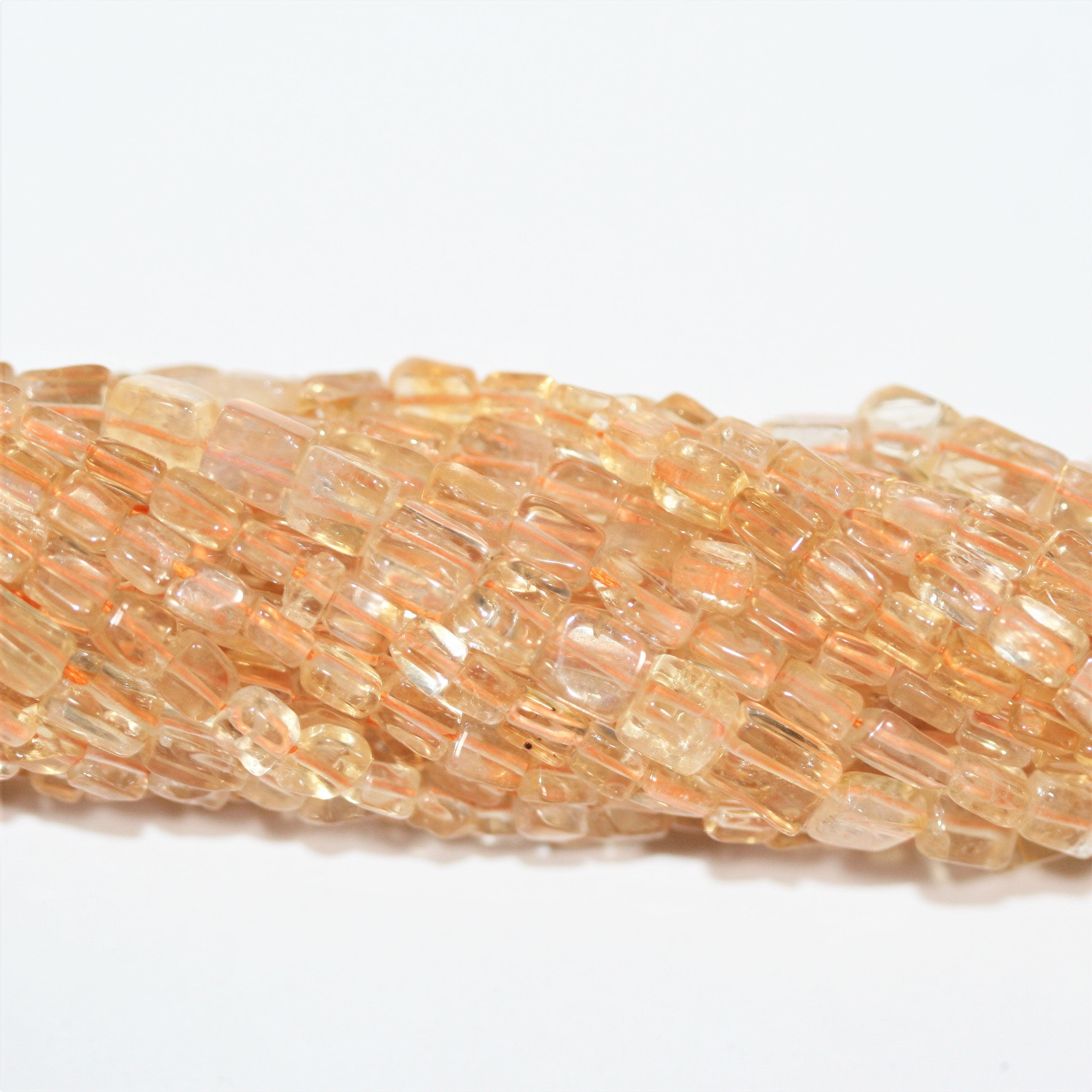 13" St Citrine Smooth Prism Beads 5x3mm. Approx.- Strand 33cm.