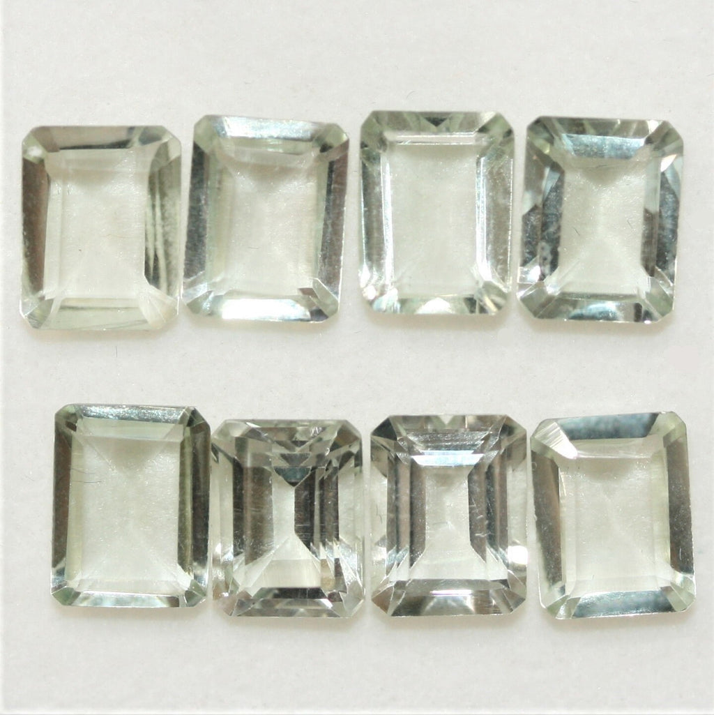 Lot de 8 pierres rectangulaires à facettes de prasiolite 9x7 mm.