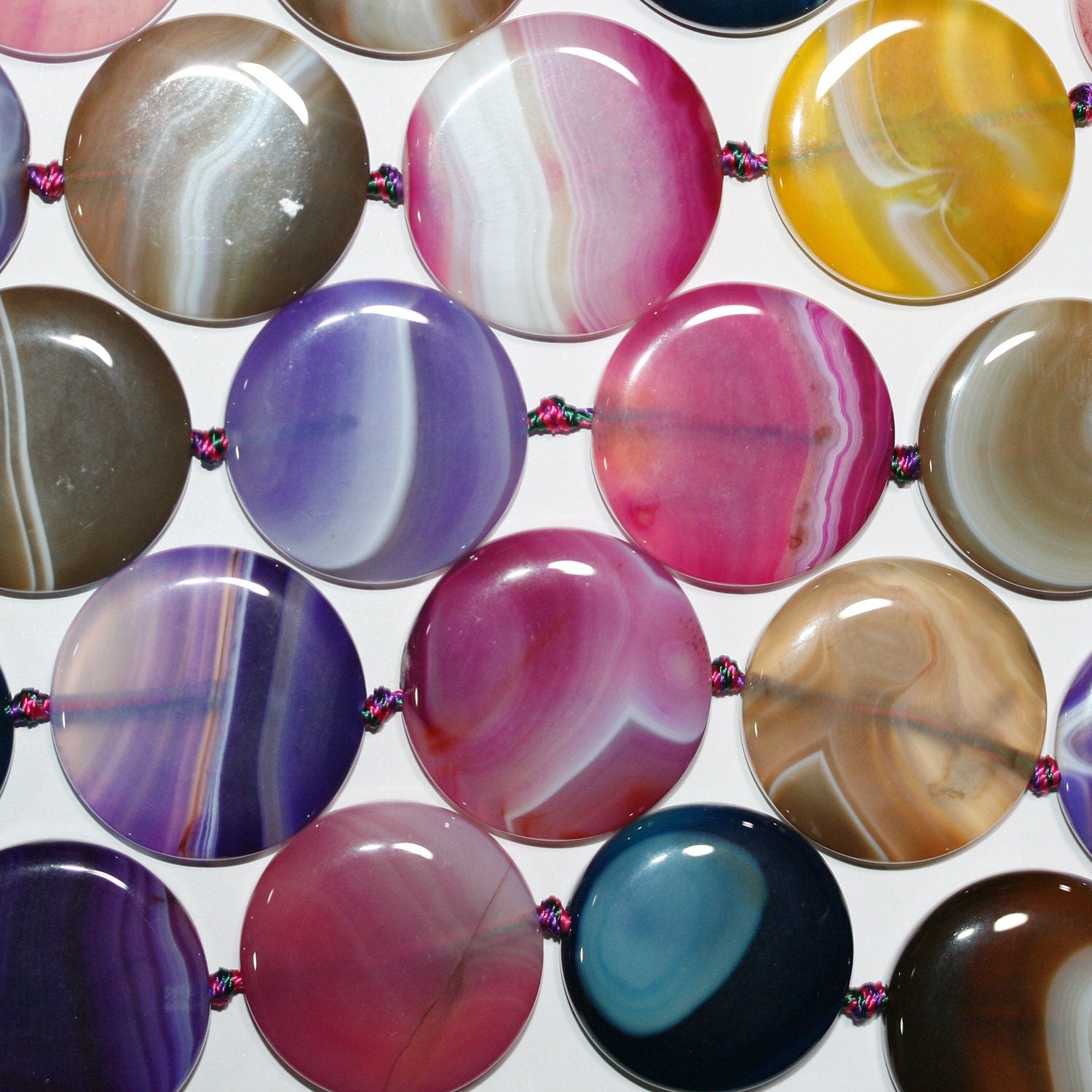 Cuentas lisas de ágata multicolor de 16" (30 mm) en forma de moneda. Tira de 40 cm.