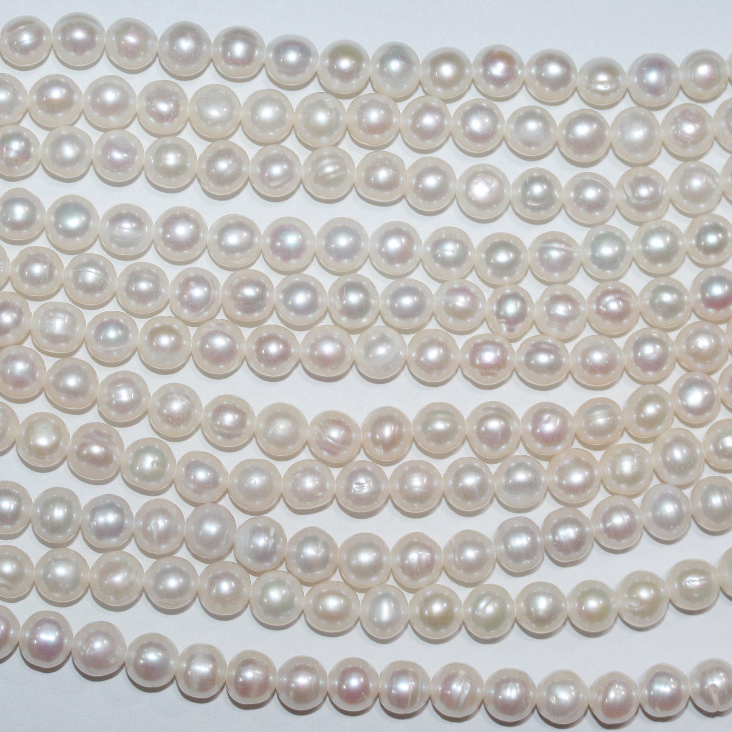 Perla de agua dulce redonda de 15" de 7 mm - Hilo de 38 cm - Precios al por mayor de perlas naturales