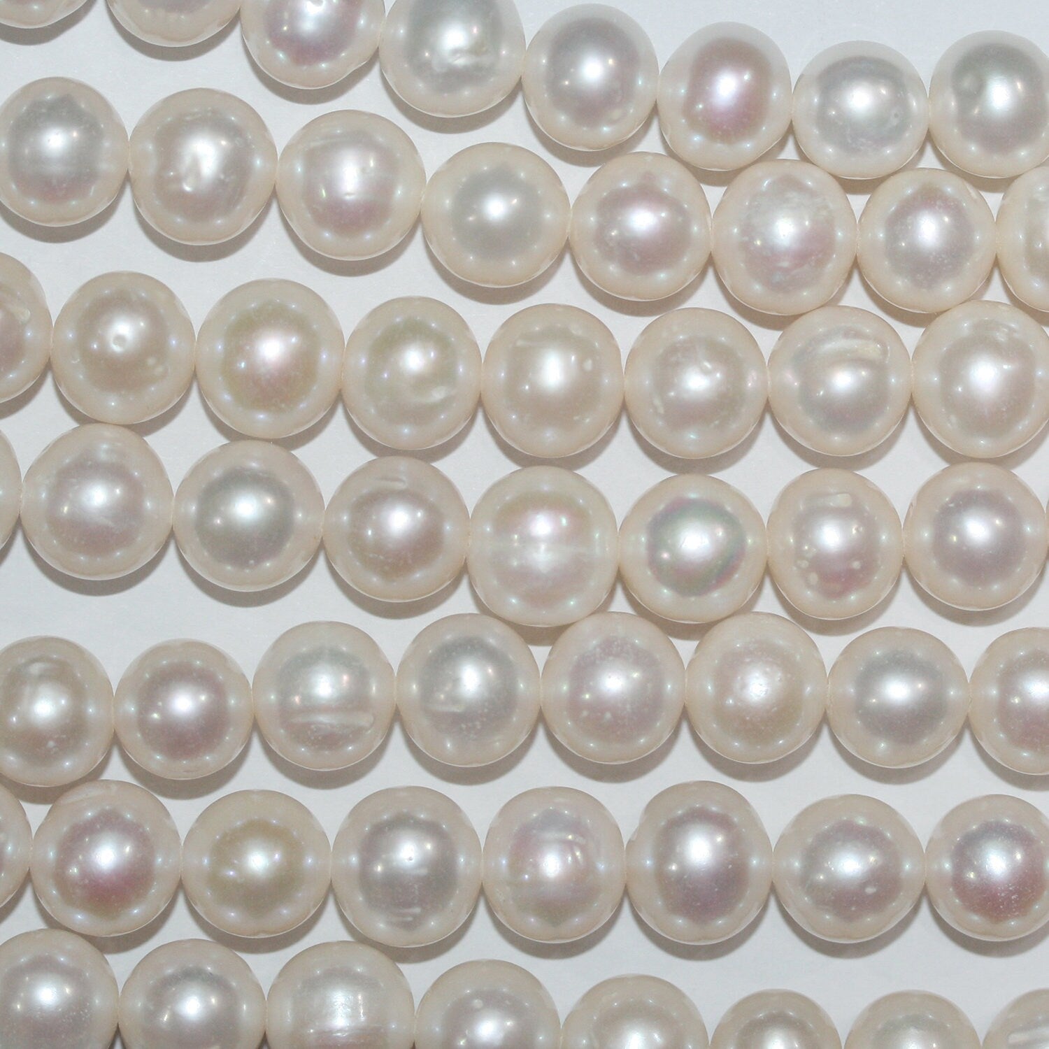 Perla de agua dulce redonda de 14" (10-11 mm) - Hilo de 38 cm - Precios al por mayor de perlas naturales