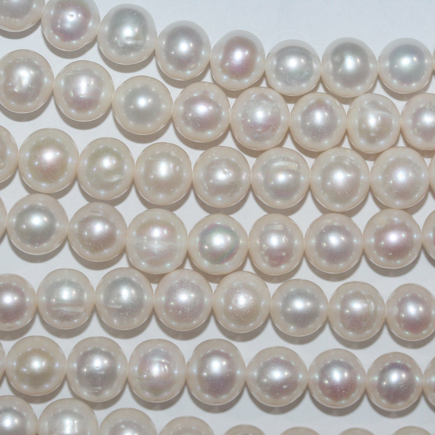 Perla de agua dulce redonda de 14" (10-11 mm) - Hilo de 38 cm - Precios al por mayor de perlas naturales