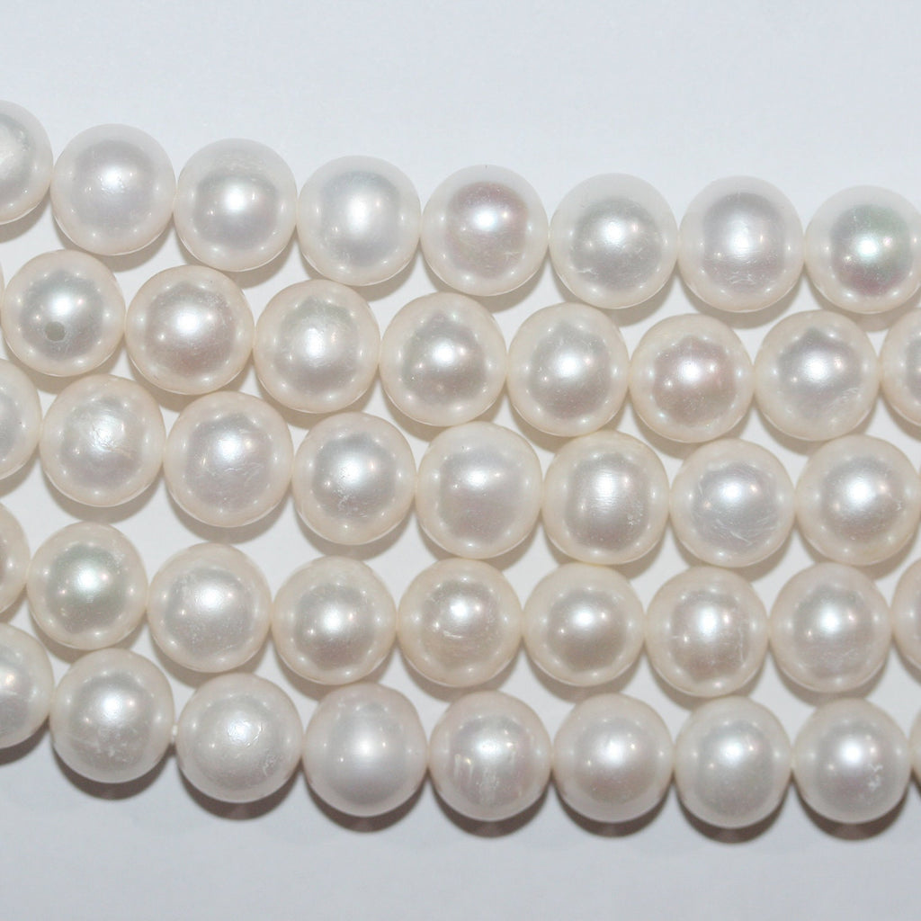 Perles rondes d'eau douce de 10 à 11 mm, 16 pouces (40 cm) de diamètre, en rang de 40 cm. Perles naturelles à prix de gros.