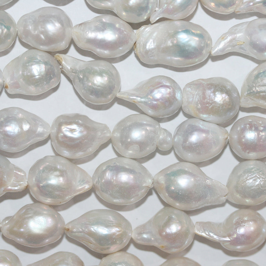 Perla Barroca de Agua Dulce de 16" (16 x 11 mm). Hilo de 40 cm aproximadamente. Precios al por mayor.