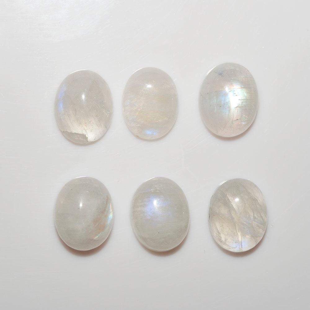 Lote de 6 cabujones ovalados de piedra lunar de 10 x 8 mm. (6 piezas)