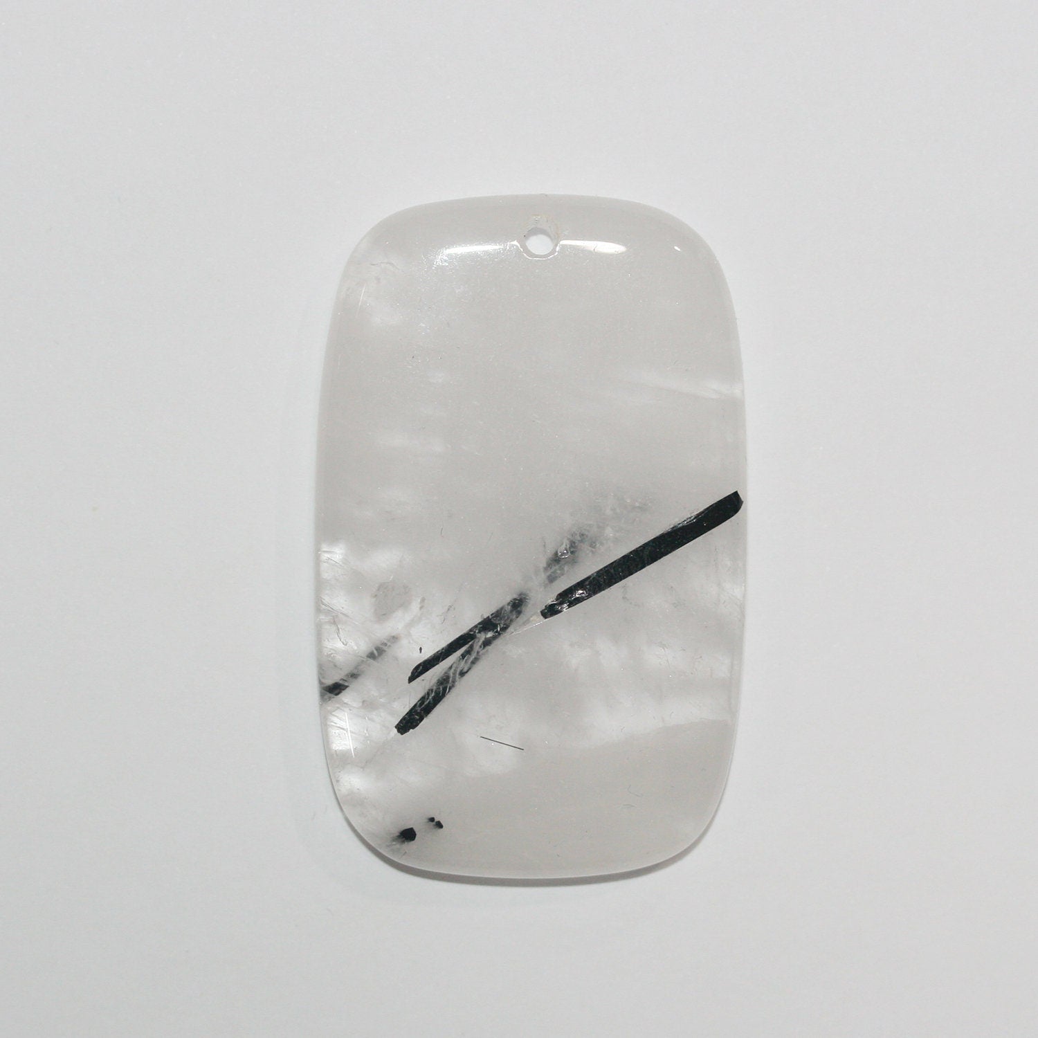 Pendentif rectangulaire en quartz tourmaliné 55x35mm. Approx.