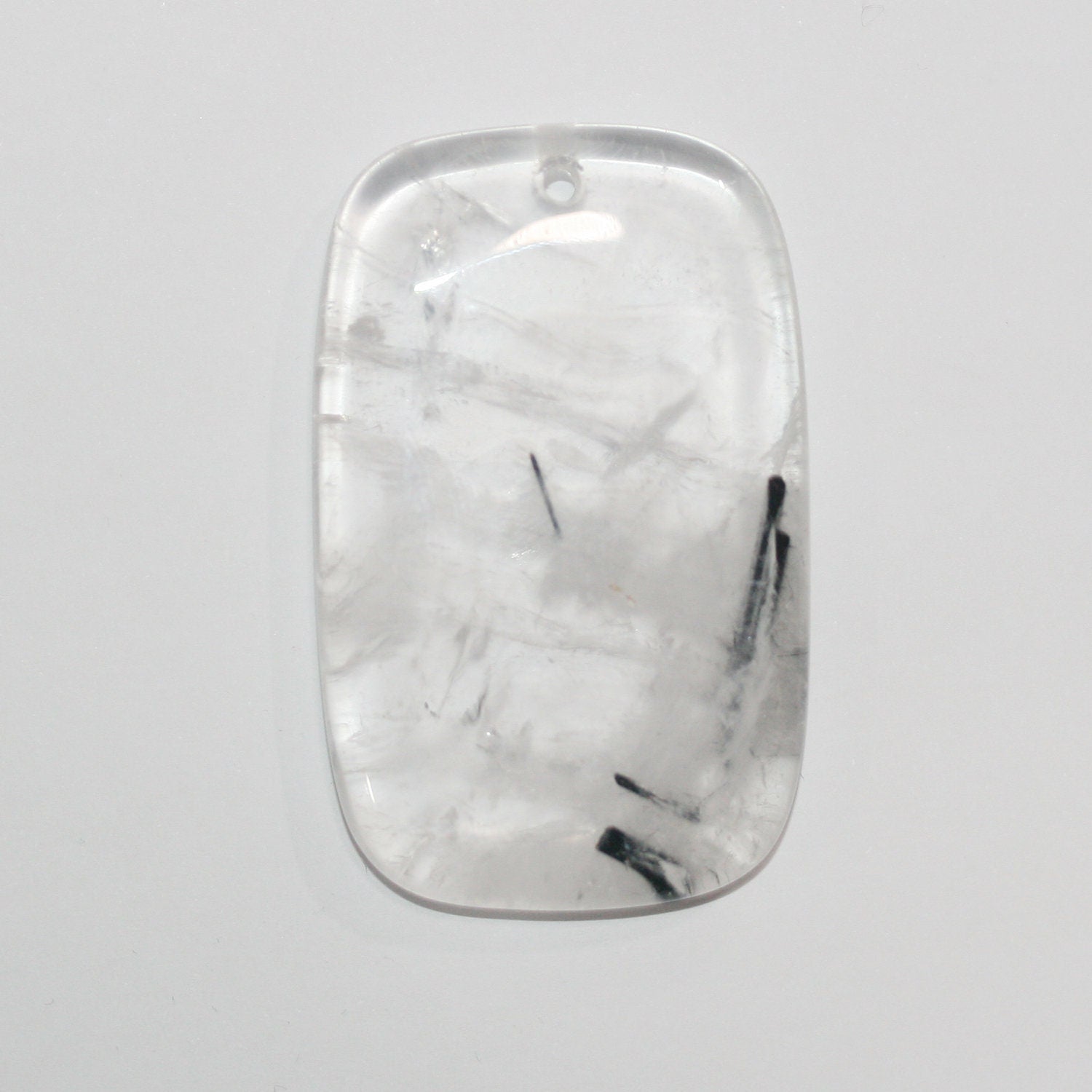 Pendentif rectangulaire en quartz tourmaliné 55x35mm. Approx.