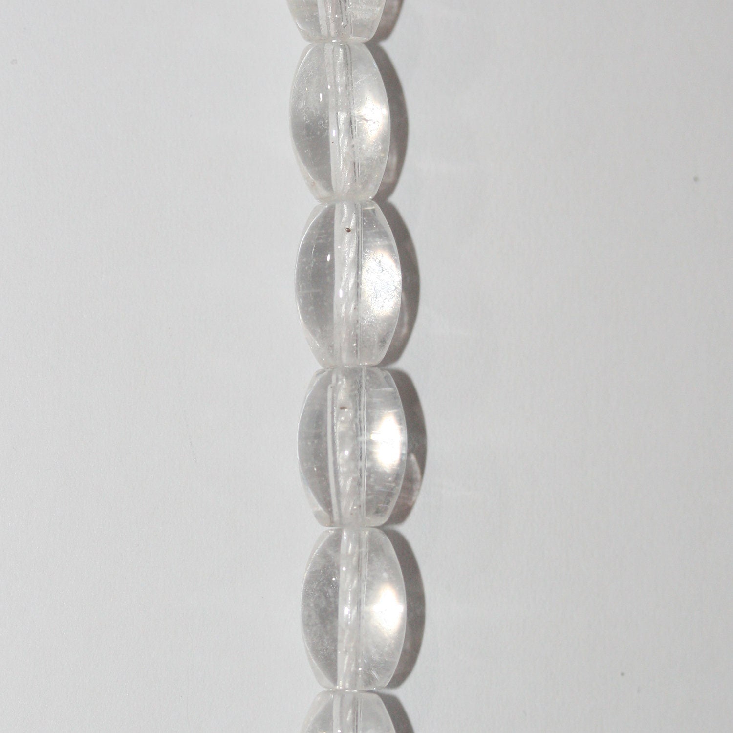 Cuentas de barril liso de cuarzo cristal de roca de 16" 10 x 6 mm - Hilo de 40 cm.