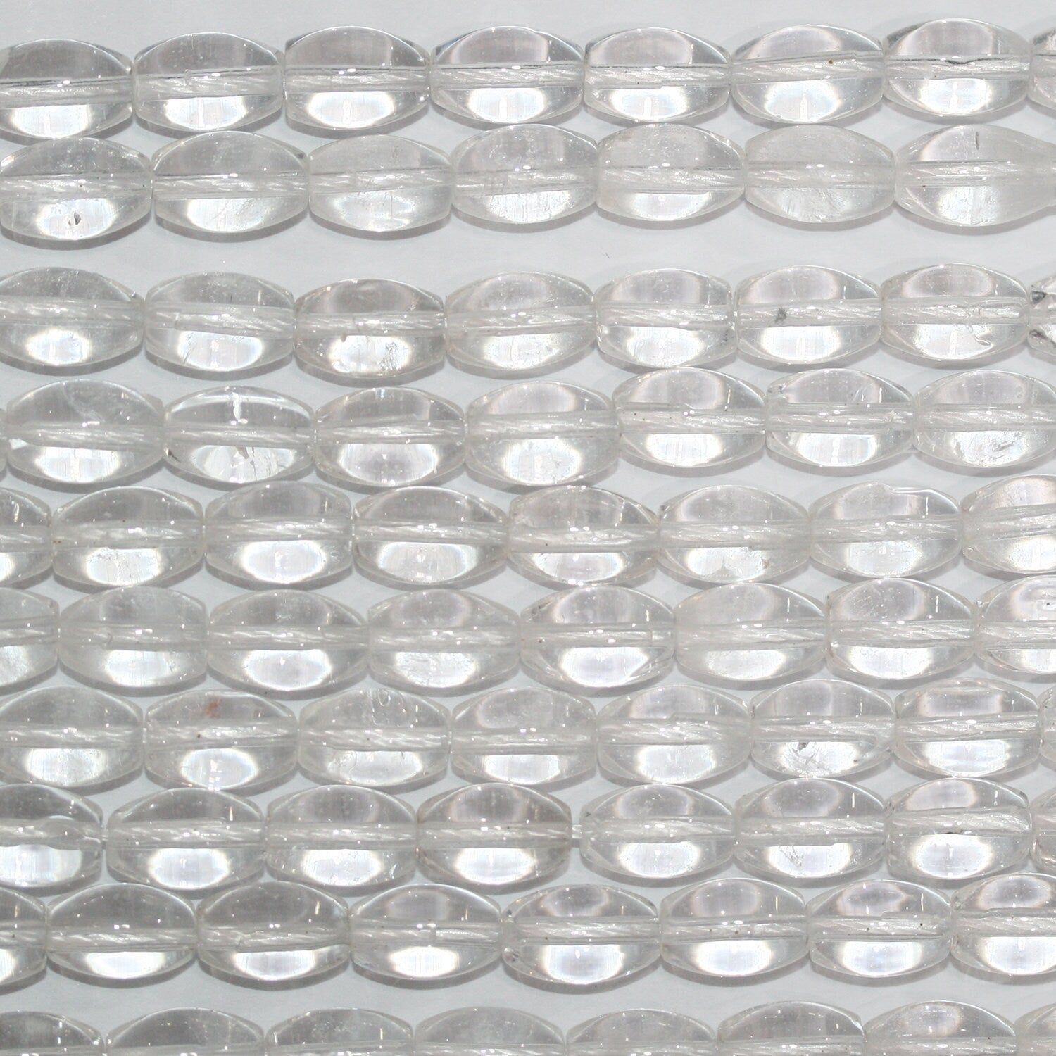 Cuentas de barril liso de cuarzo cristal de roca de 16" 10 x 6 mm - Hilo de 40 cm.