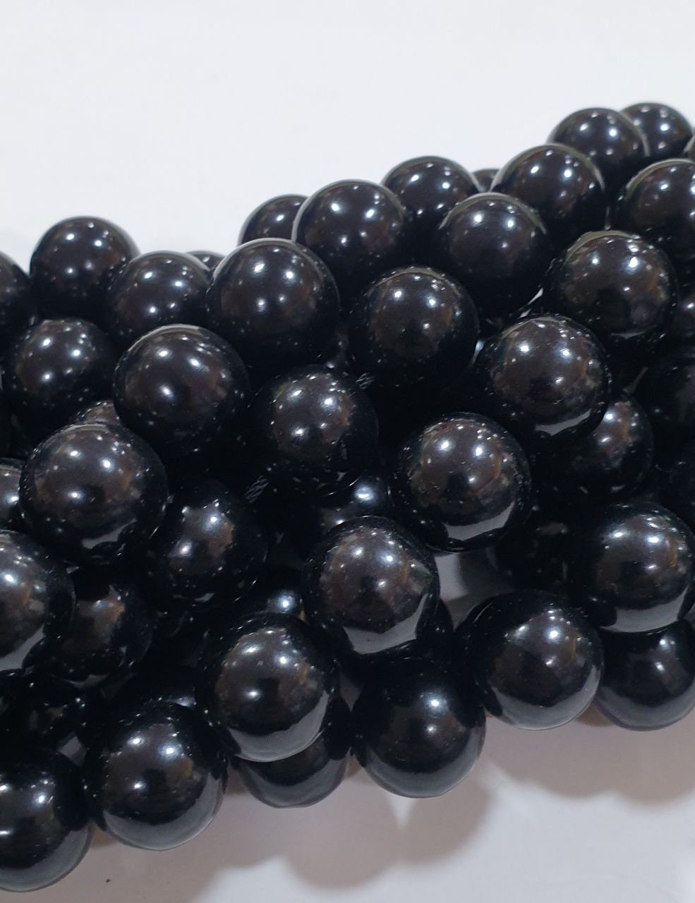 Brin de perles rondes en lignite naturelle de 14 mm - Longueur : 40 cm