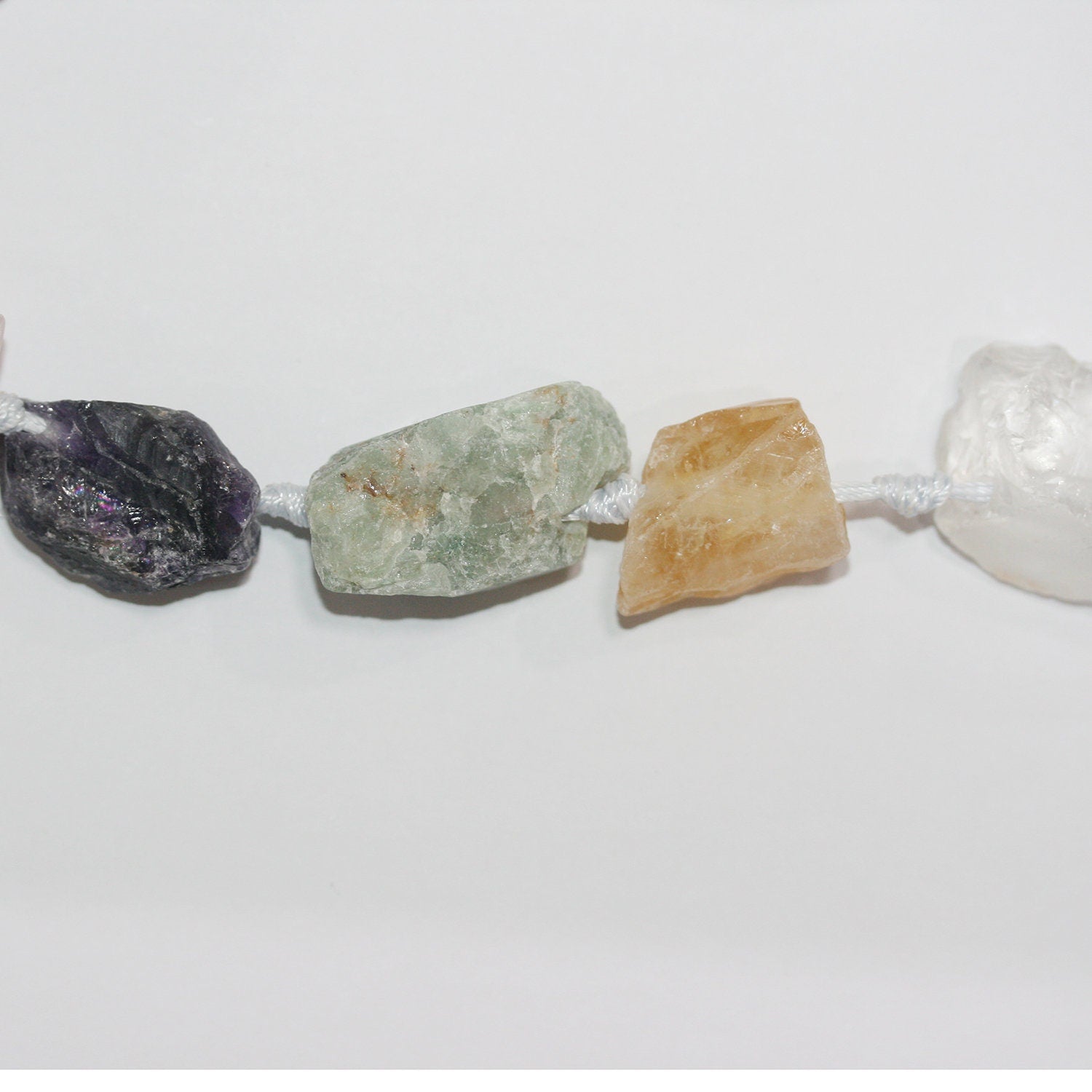 Cuentas de pepitas multipiedra sin pulir de 16" St, 20-30 mm aprox. - Hilo de 40 cm.