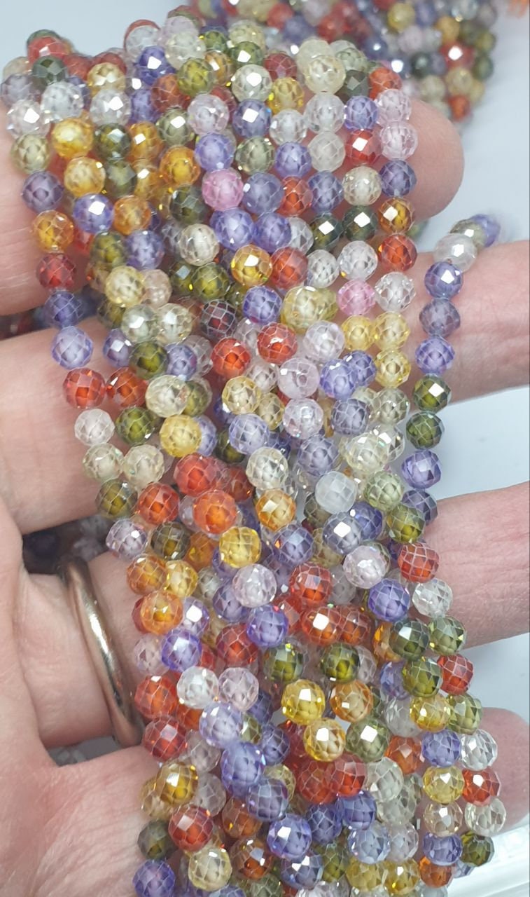15" perles rondes à facettes en zircon cubique multicolore de 4 mm - Fil de 39 cm