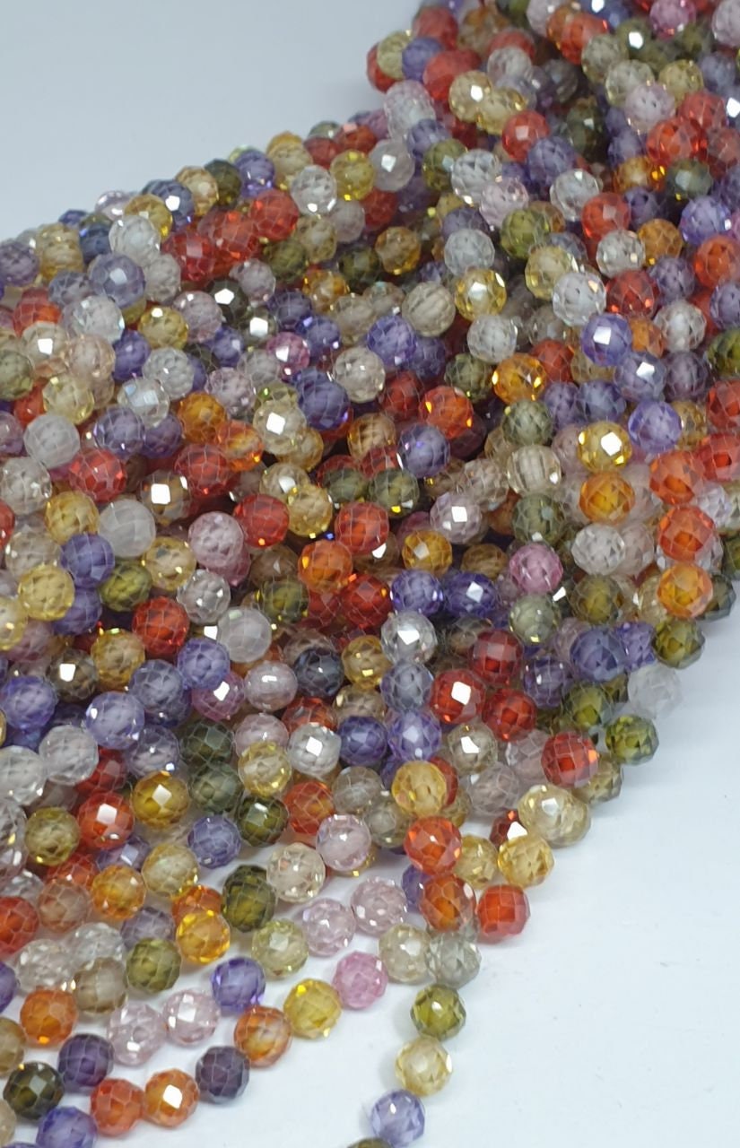 15" perles rondes à facettes en zircon cubique multicolore de 4 mm - Fil de 39 cm