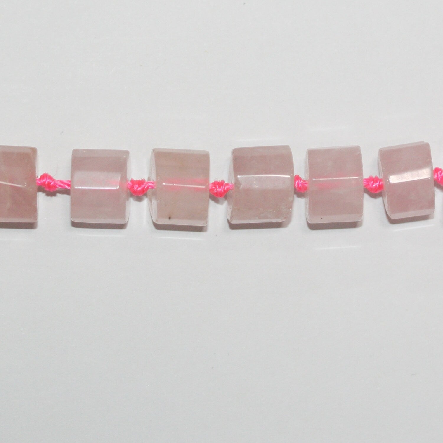 Cuentas de disco facetadas de cuarzo rosa de 17", 11 x 8 mm. Aprox. - Hilo de 43 cm.