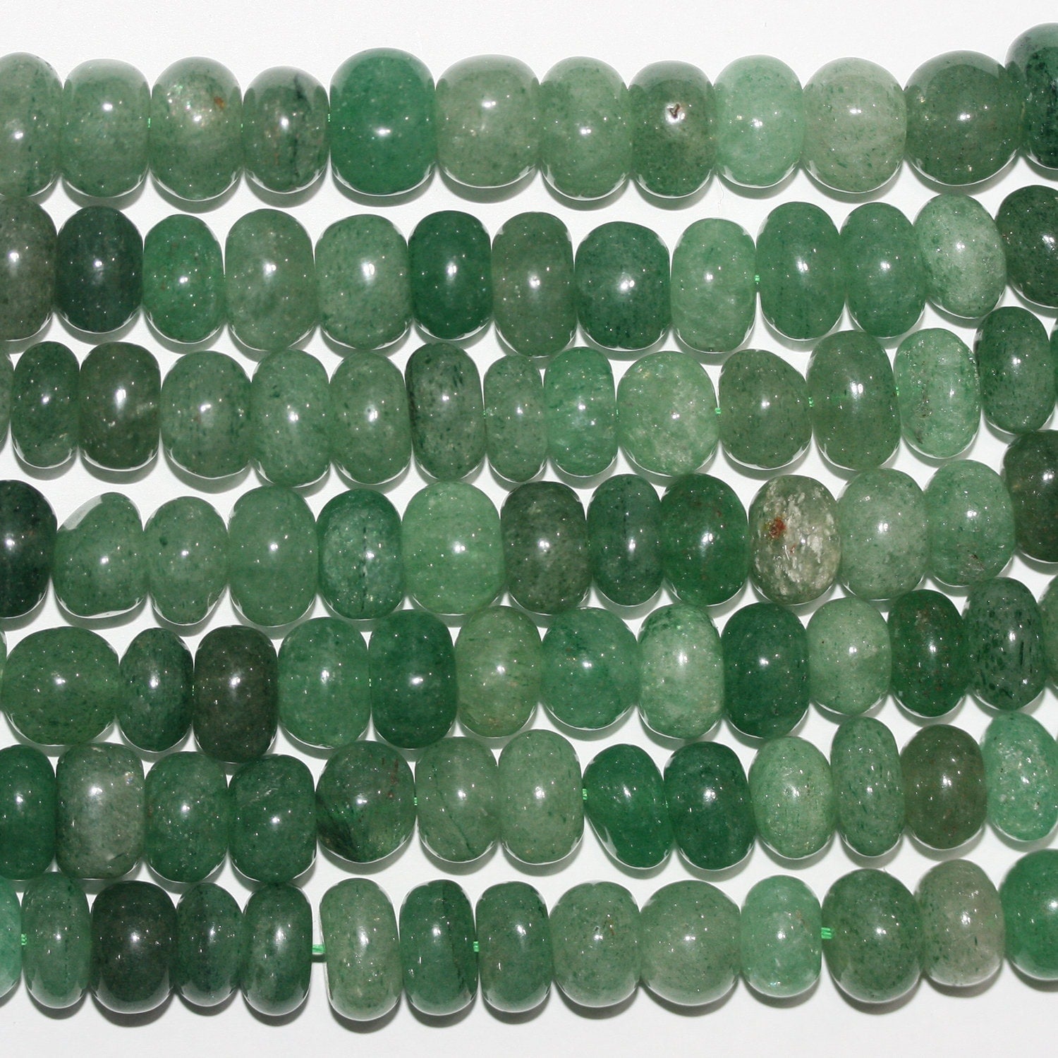 Perles rondelles lisses irrégulières en aventurine St de 15 pouces (10 x 6 mm). Longueur approximative du fil : 39 cm.