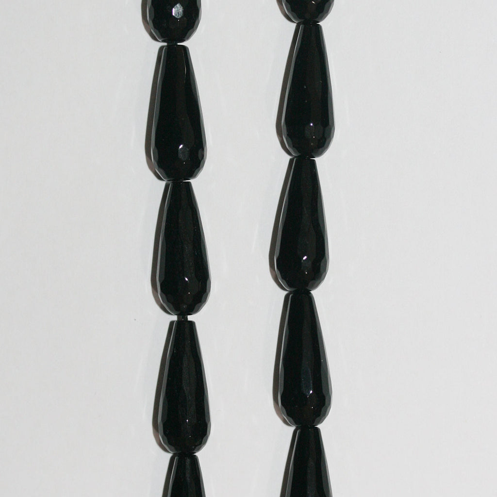 Cuentas de ónix facetado de 16" de St., 20 x 8 mm, hilo de 40 cm.