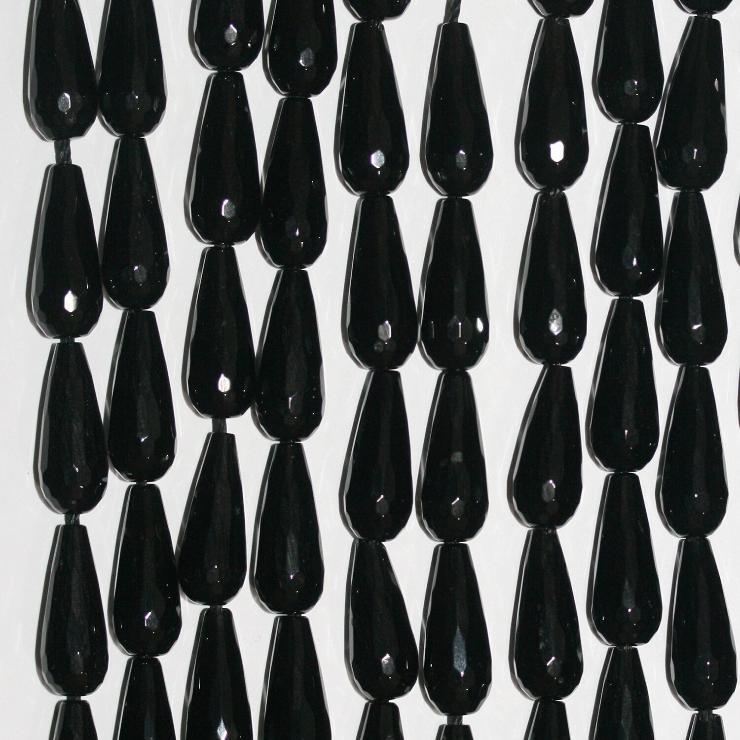 Cuentas de ónix facetado de 16" de St., 20 x 8 mm, hilo de 40 cm.