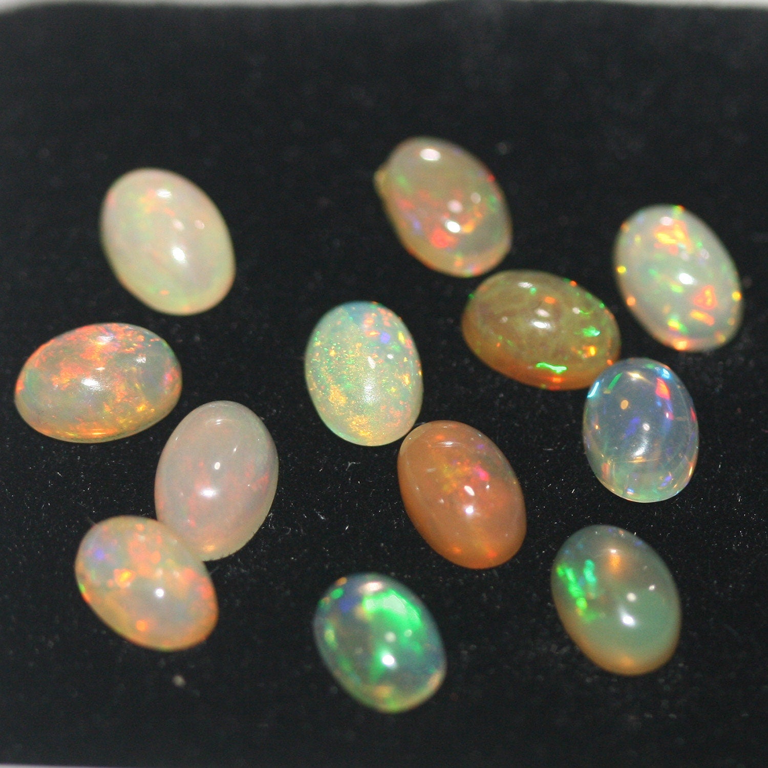 Ethiopian Opal Lot Oval Cabochon 6x4mm. (12pcs) -Gemstone Parcels-Loose Stones Wholesale Price