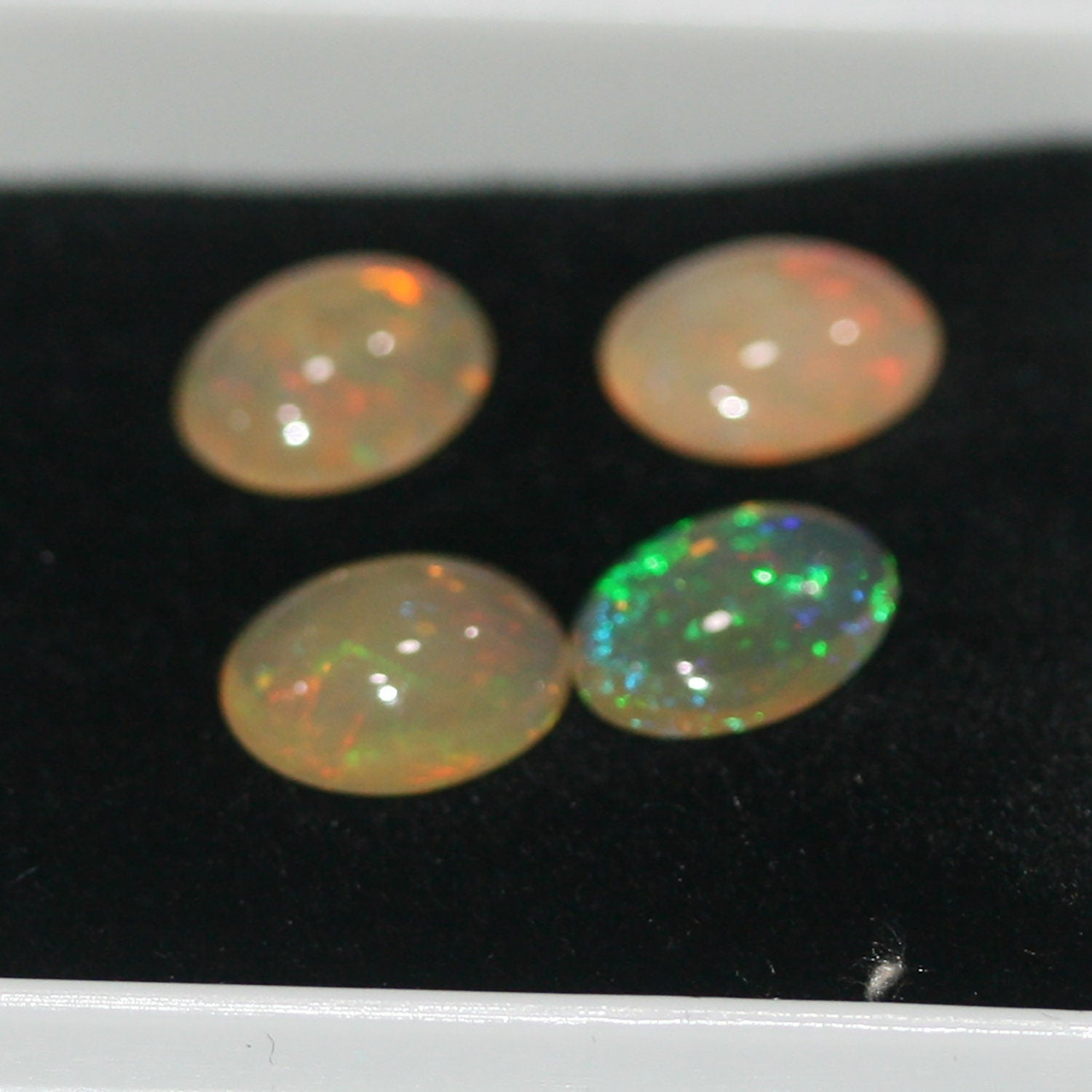 Ethiopian Opal Lot Oval Cabochon 9x7mm.(4Pcs) -Gemstone Parcels-Loose Stones Wholesale Price