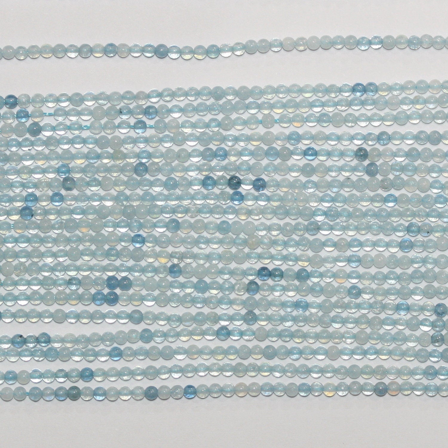 15" Perles rondes lisses en aigue-marine 2 mm.-Rig 39 cm.