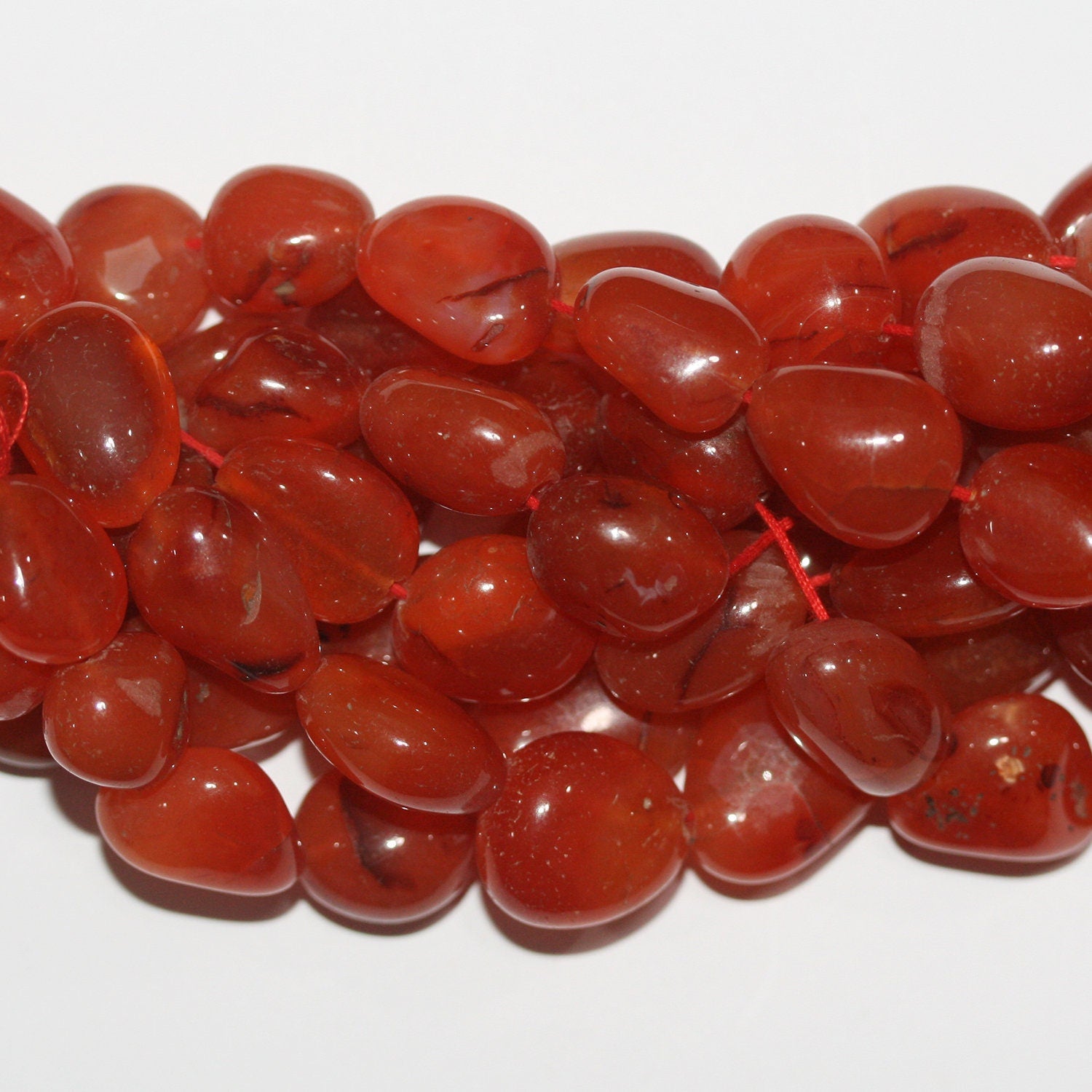 Cuentas de pepitas lisas de cornalina de Santa de 16", 20 x 15 mm (aprox.), tira de 40 cm.