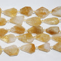 Perles de citrine facettées en forme de pépite, 15 pouces (25 x 15 mm). Longueur approximative du brin : 39 cm.