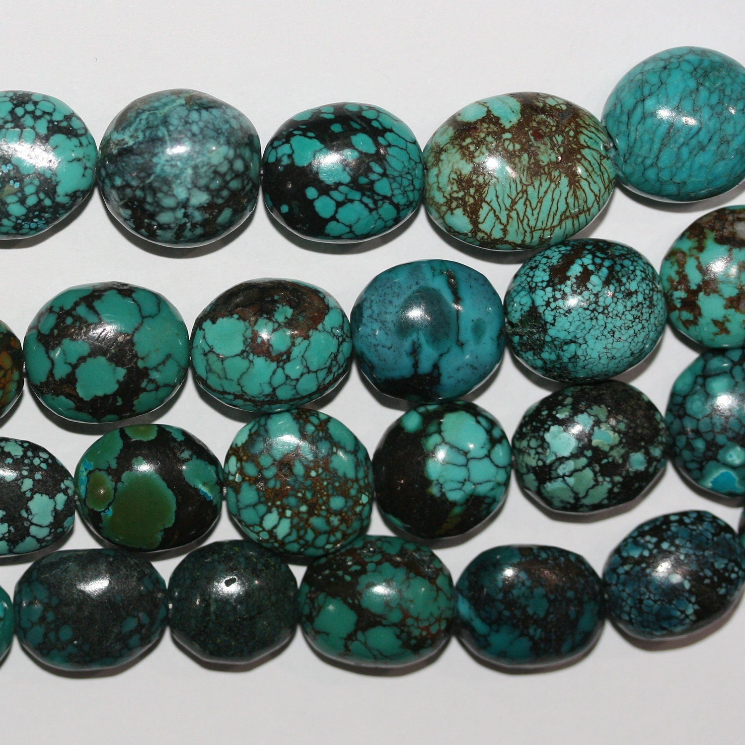 16" Cuentas Ovaladas Lisas Turquesa 16x14mm aprox.- Hilo 40cm.