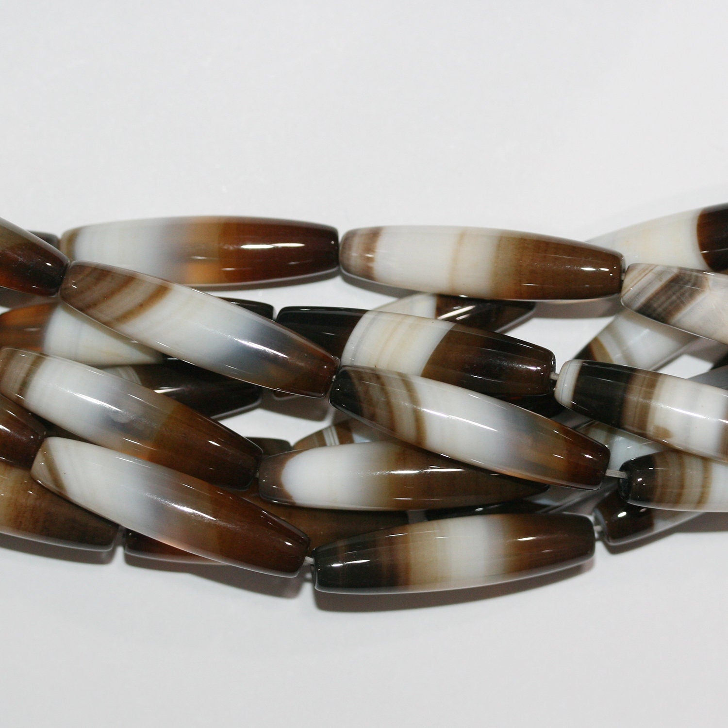 Perles cylindriques lisses en agate à rayures brunes St 15" 34x8mm.-Rig 39cm.
