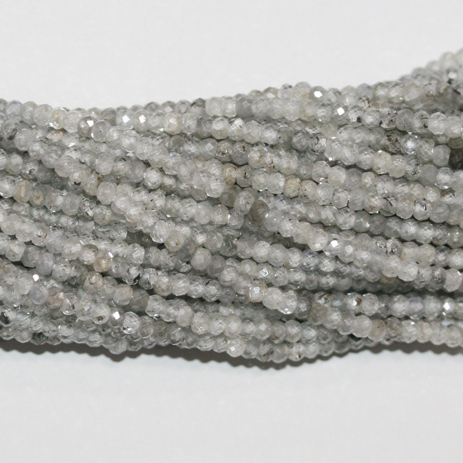 Perles rondelles à facettes en zircon gris St 15" 3x2mm.-Rig 39cm.