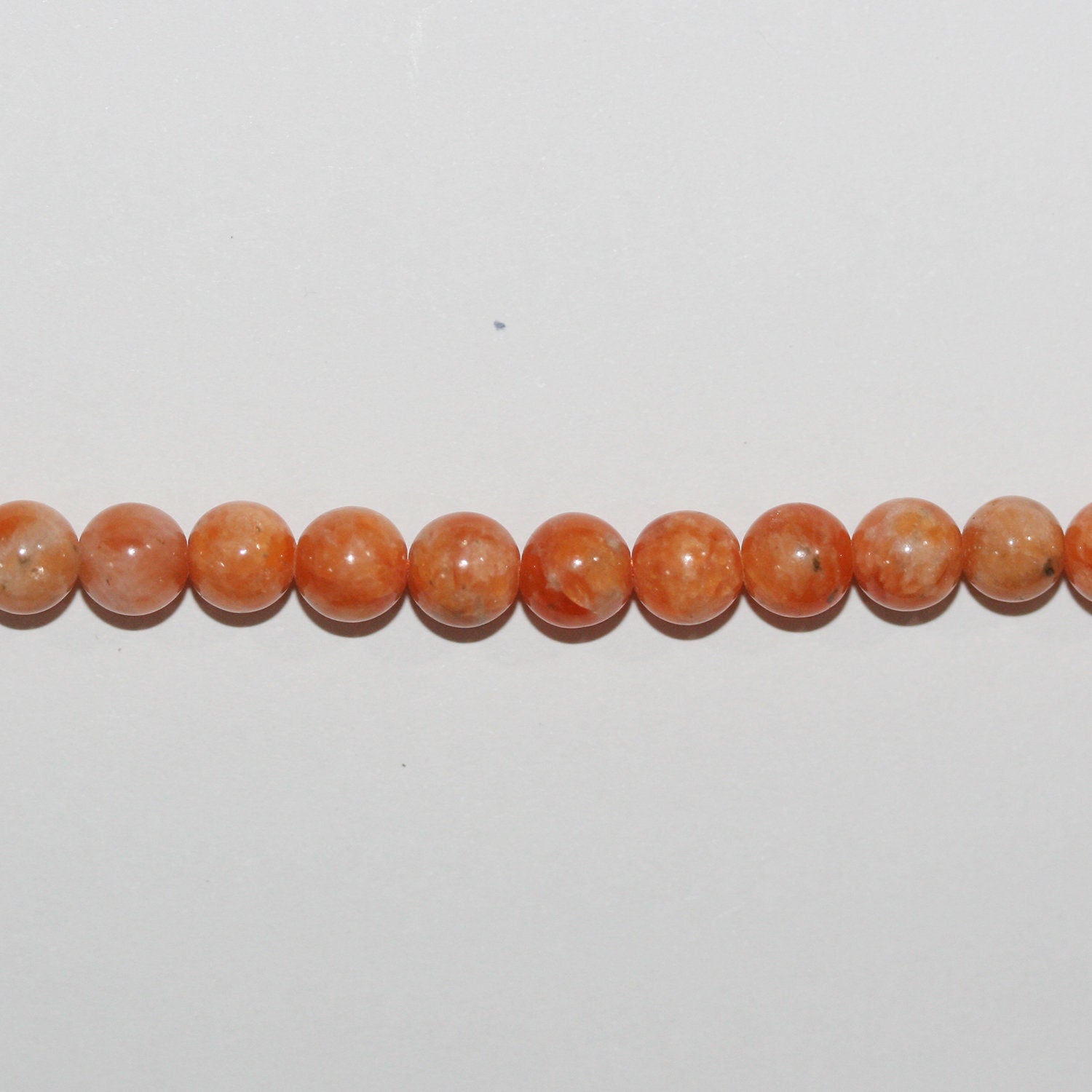Perles rondes lisses en calcite St de 15 pouces, 6 mm - Fil de 39 cm.