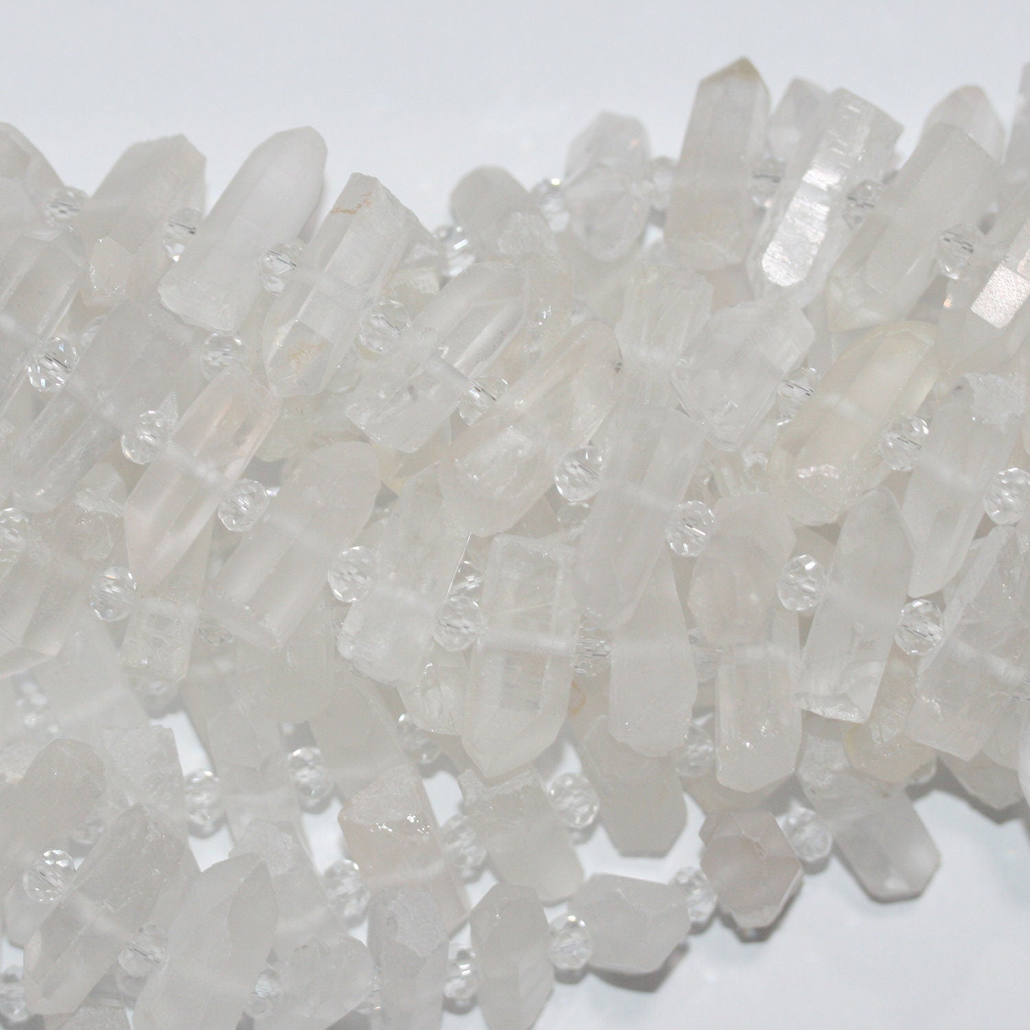 Perlas de cristal de roca de cuarzo de 16" con acabado mate sin pulir, 24 x 9 mm, aprox. - Hilo de 40 cm.