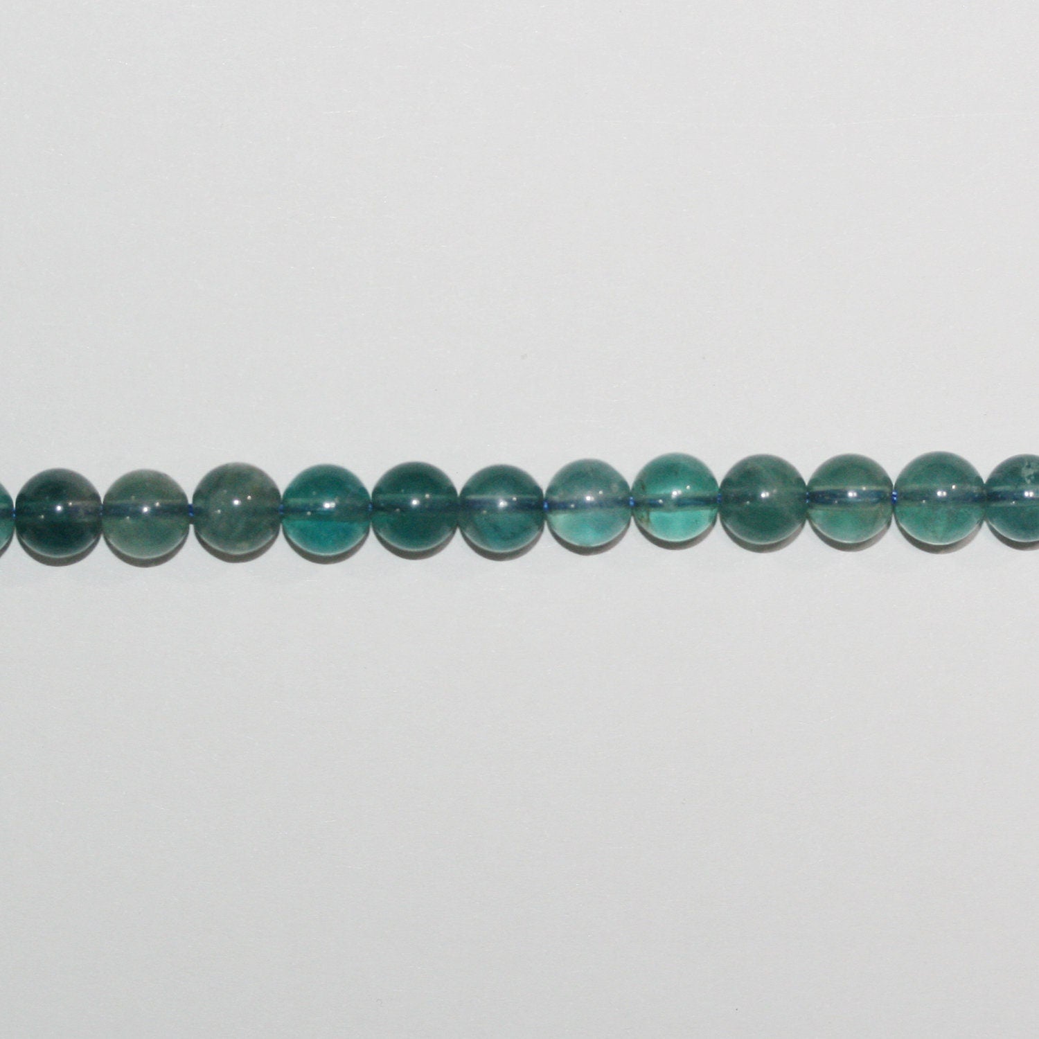 Perles rondes lisses en fluorite bleue St 15" 6 mm.-Rig 39 cm.