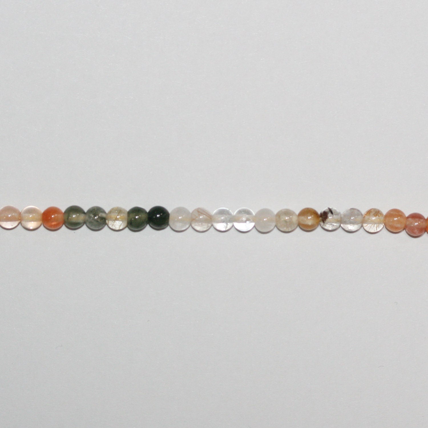 Perles rondes lisses en quartz rutile St 15" 4 mm.-Rig 39 cm.
